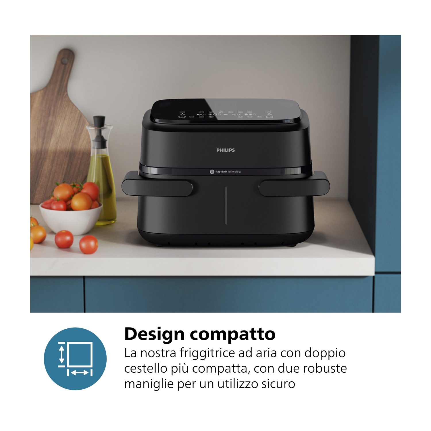 Friggitrice ad aria Philips nera con touchscreen, accanto a pomodori e olio.