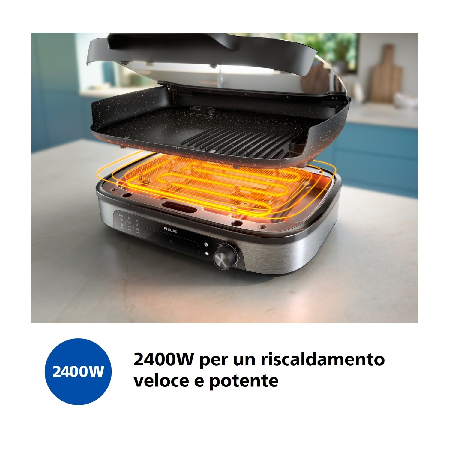 Una griglia aperta con elementi riscaldanti luminosi e una piastra.