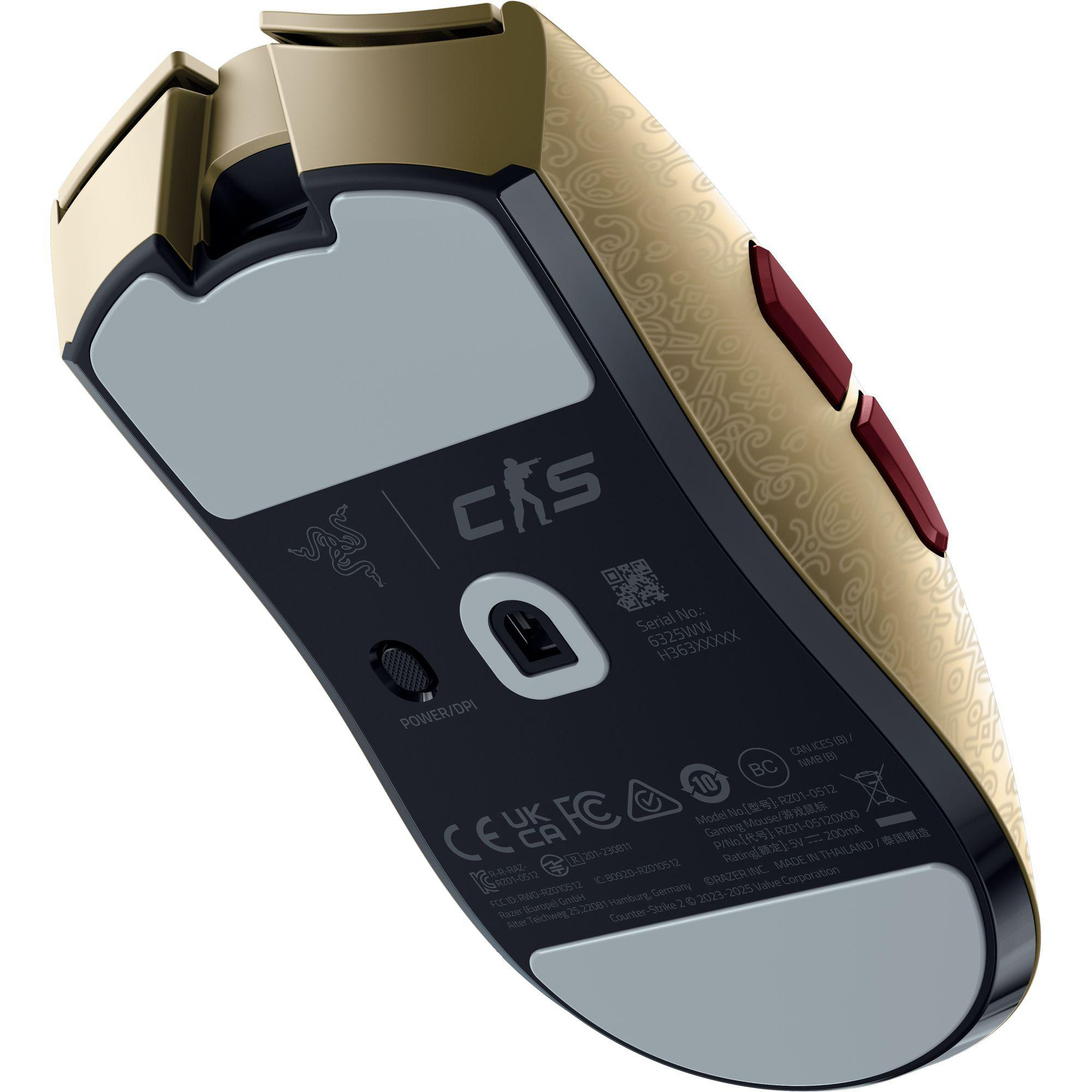 Goldene Mausunterseite mit Muster, Logo und technischen Details.