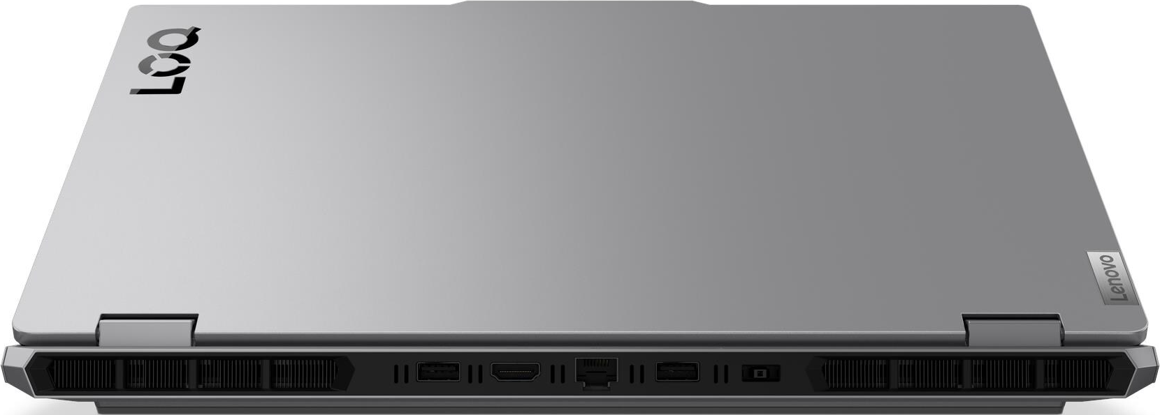 Vue de dessus d'un ordinateur portable gris, montrant les ports et les évents sur le bord inférieur.