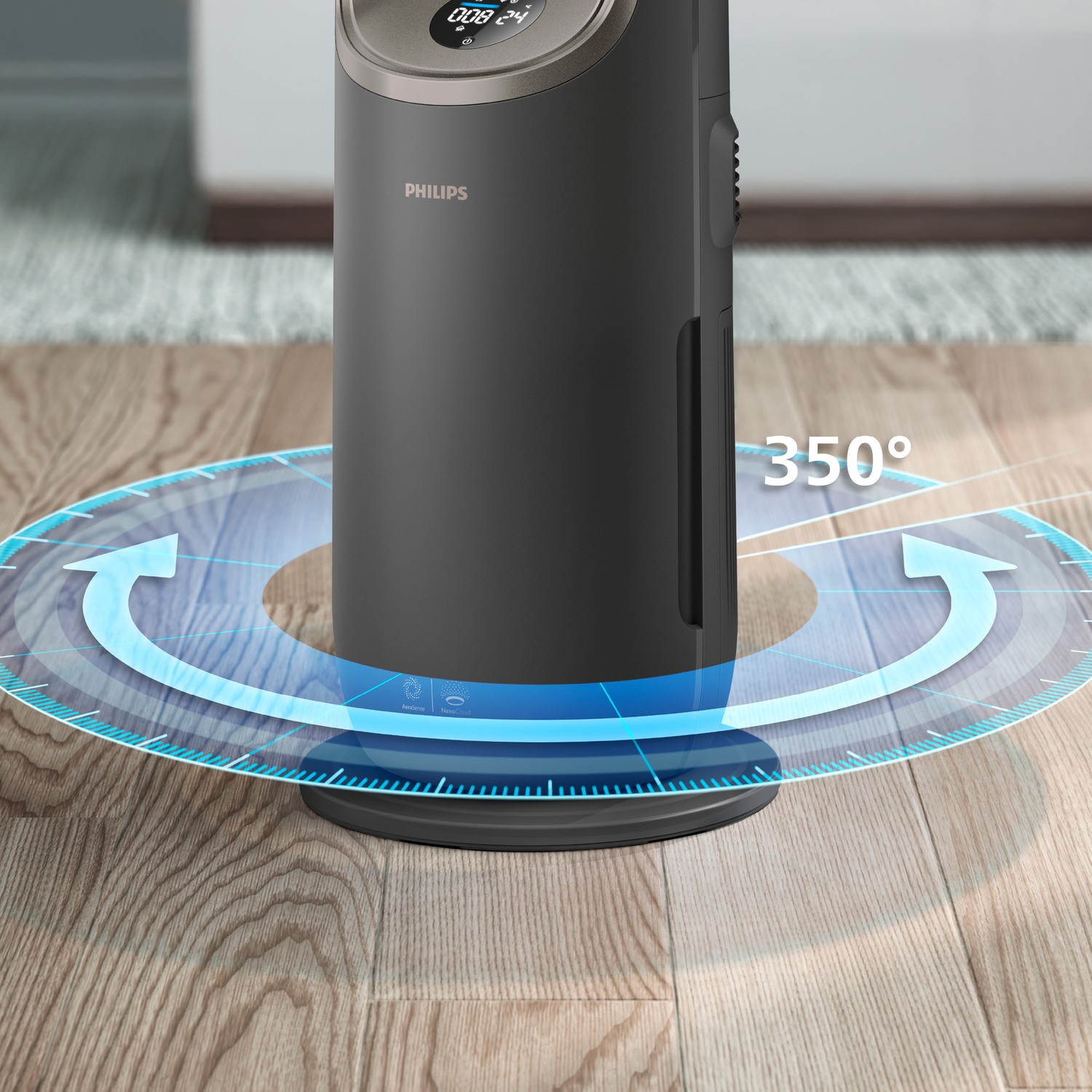 A black air purifier rotates on a wooden floor, with a blue 350-degree circular arrow around it.