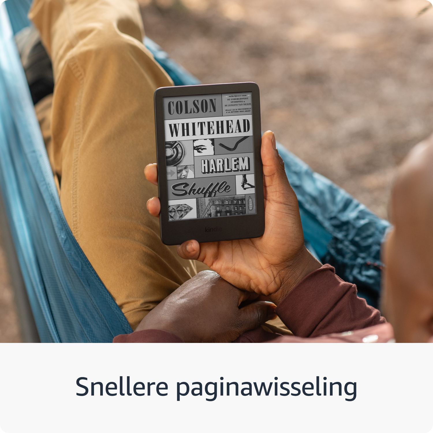 Person reading an e-book in a hammock. The screen shows a book cover.