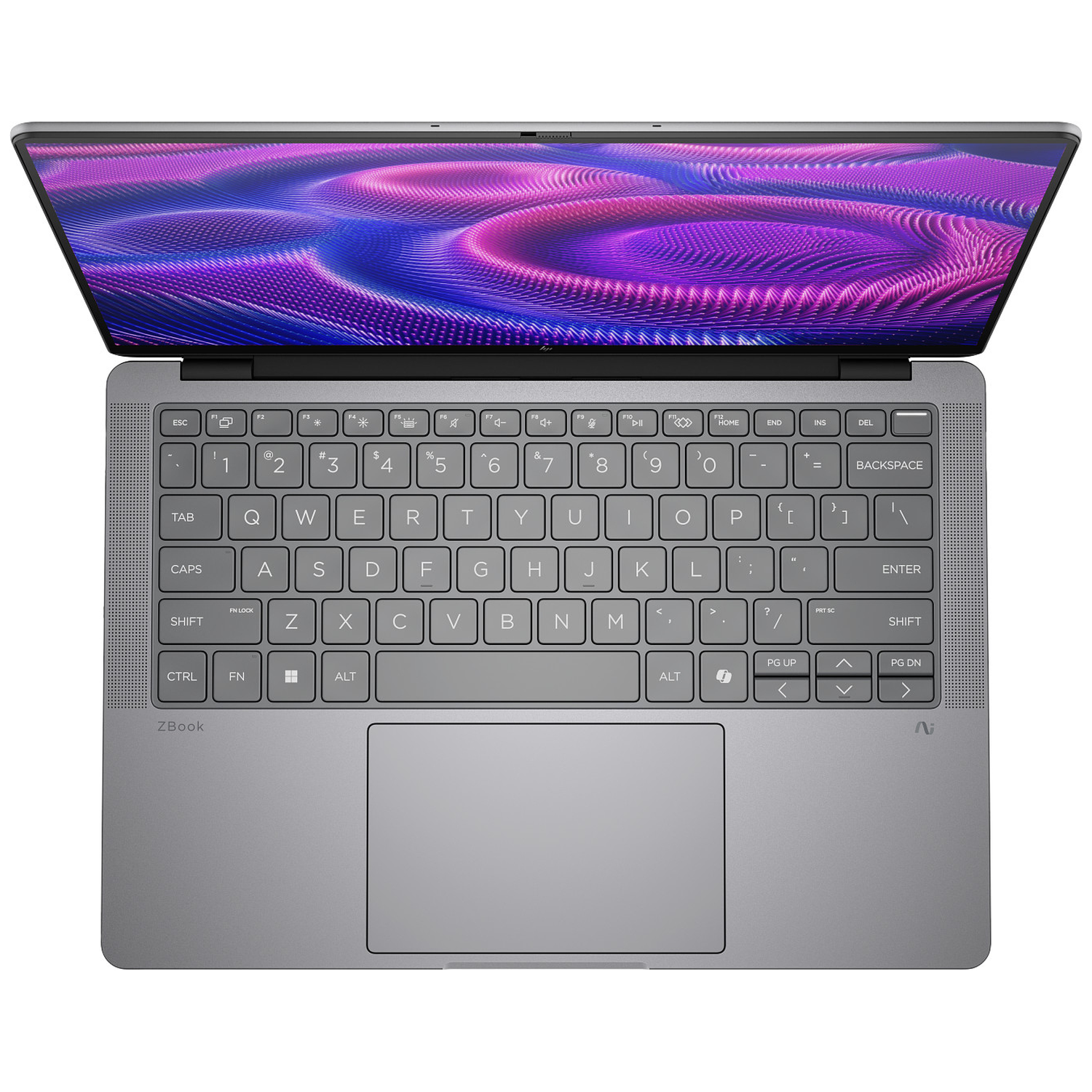 An open silver laptop with a purple and pink patterned screen.