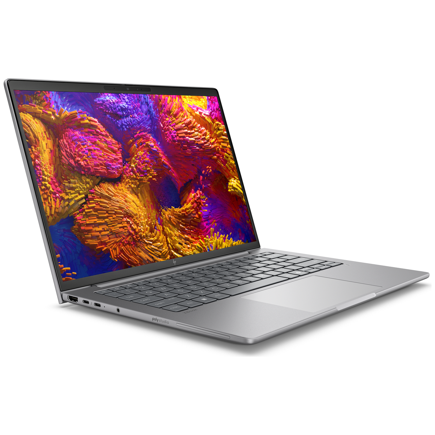 A silver laptop displays a vibrant, abstract graphic on its screen, angled slightly.