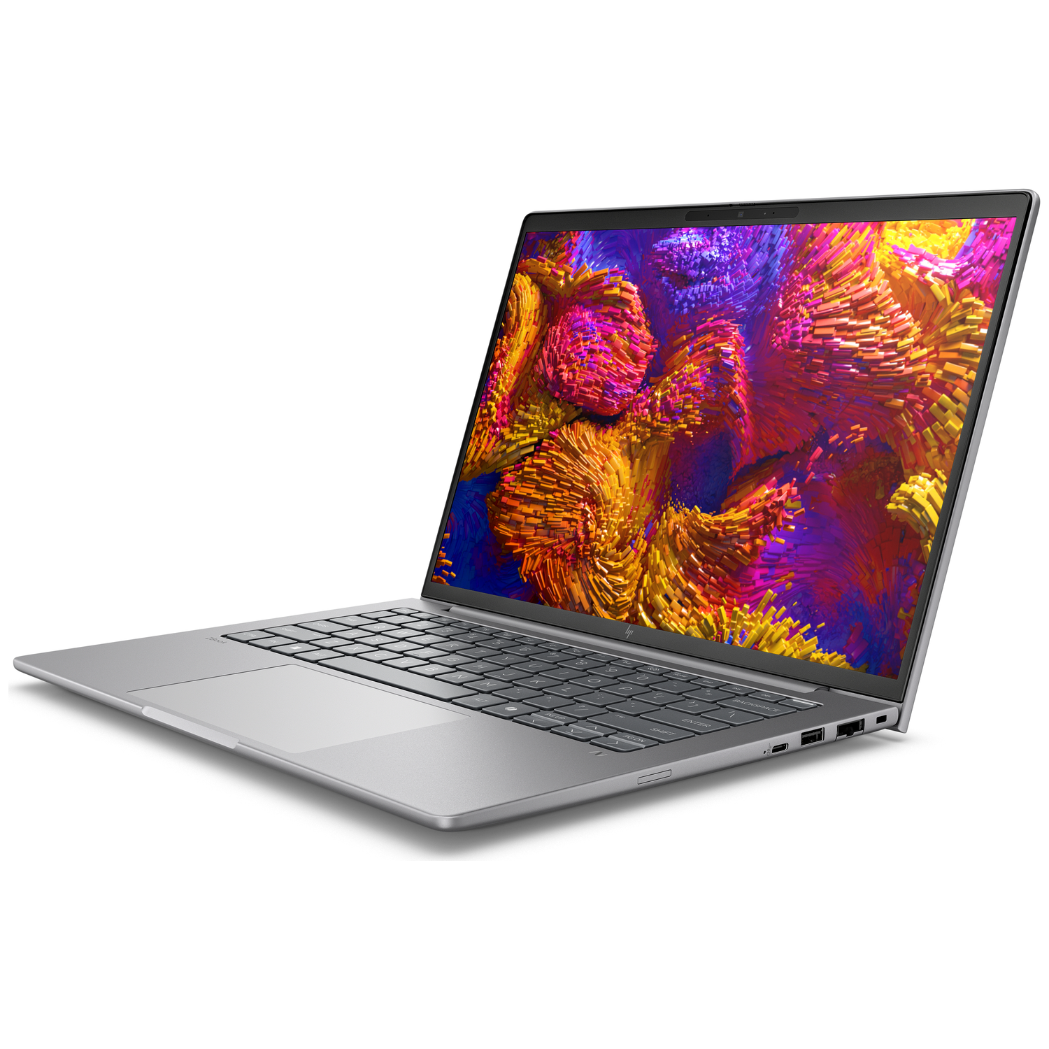 An open silver laptop displaying a colorful, abstract background on its screen.