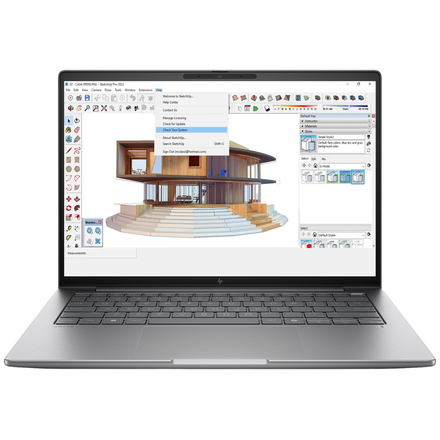 Een laptop toont SketchUp Pro 2022 software met een huismodel.
