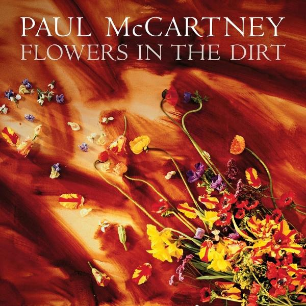 Paul McCartney Flowers in the Dirt albumhoes met kleurrijke bloemen op rode achtergrond.