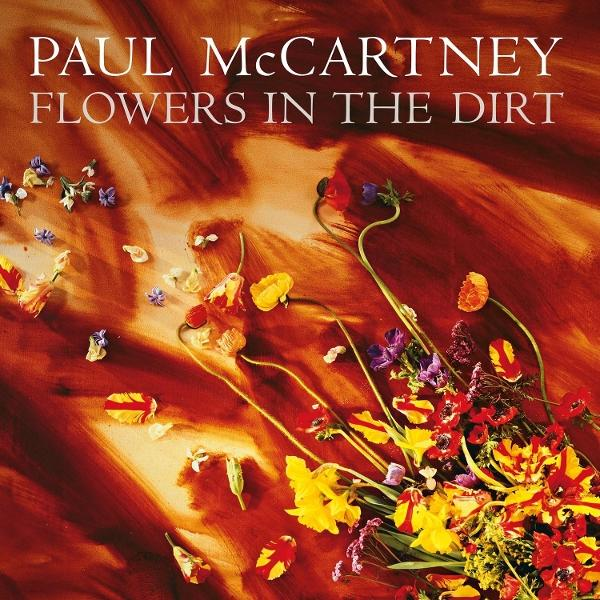 Pochette de l'album Paul McCartney Flowers in the Dirt avec des fleurs colorées sur fond rouge.