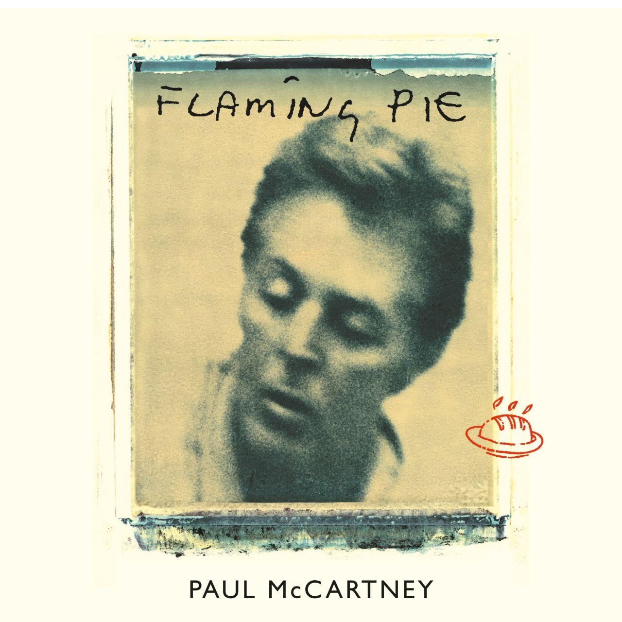 Albumhoes met het hoofd van Paul McCartney en de titel "Flaming Pie".
