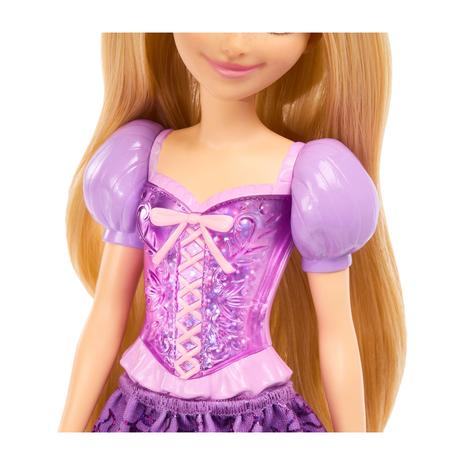 Una bambola con lunghi capelli biondi, corsetto e gonna viola.