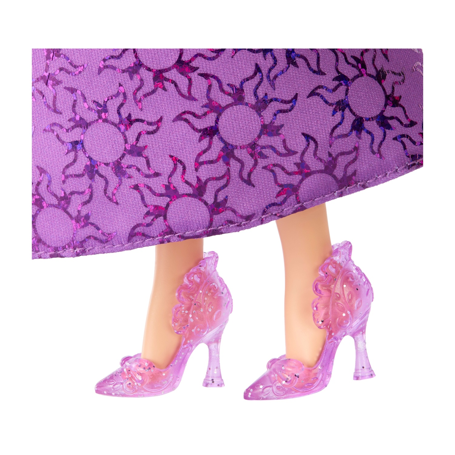 Abito viola con motivo a sole e décolleté trasparenti glitterati.