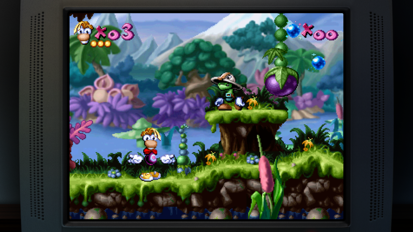 Scena gry Rayman z kolorową florą, górami i pływającymi platformami. Rayman stoi na platformie.