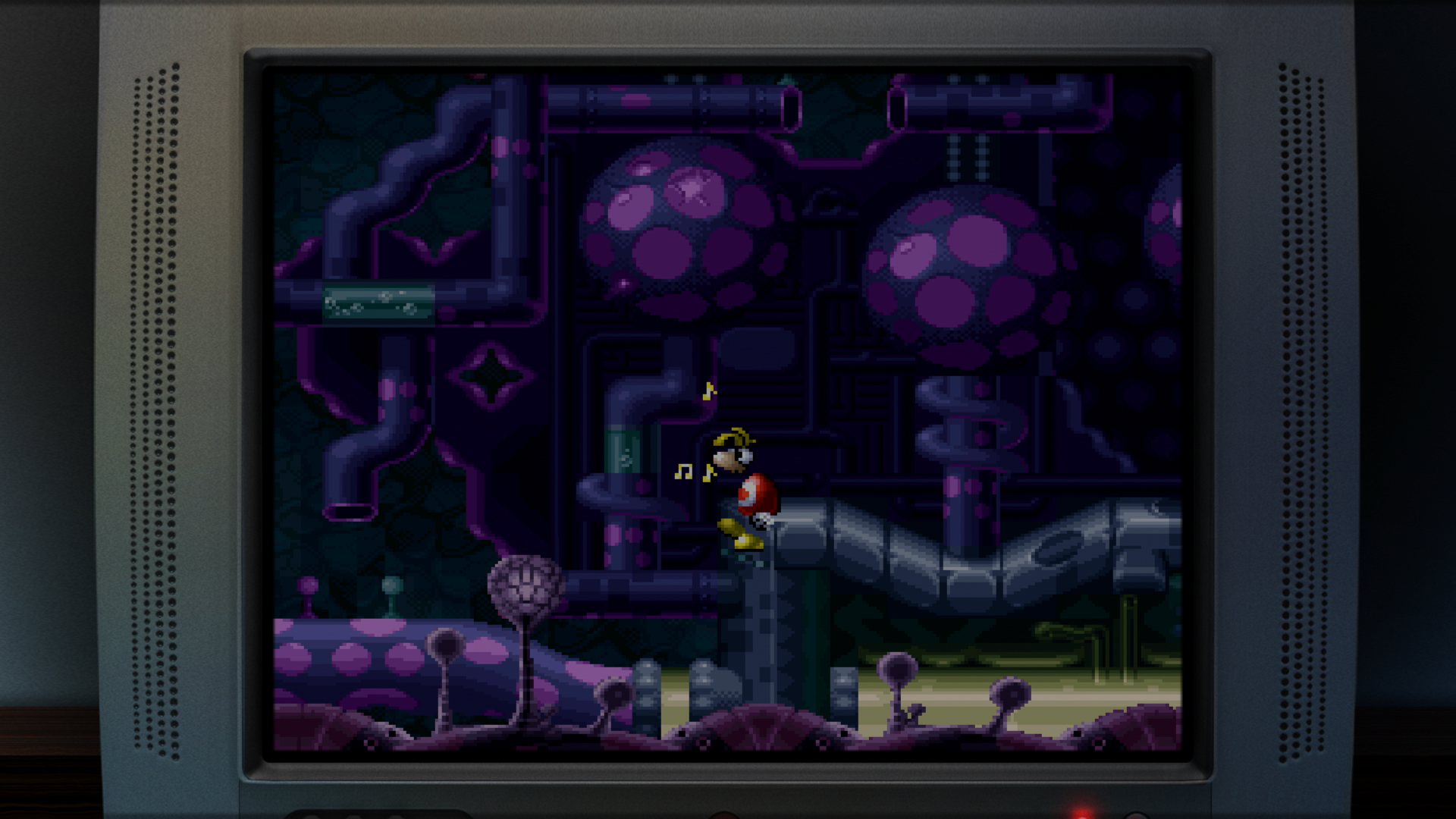 Rayman stoi na platformie w ciemnym, fioletowym świecie rur z dużymi kulami grzybów.