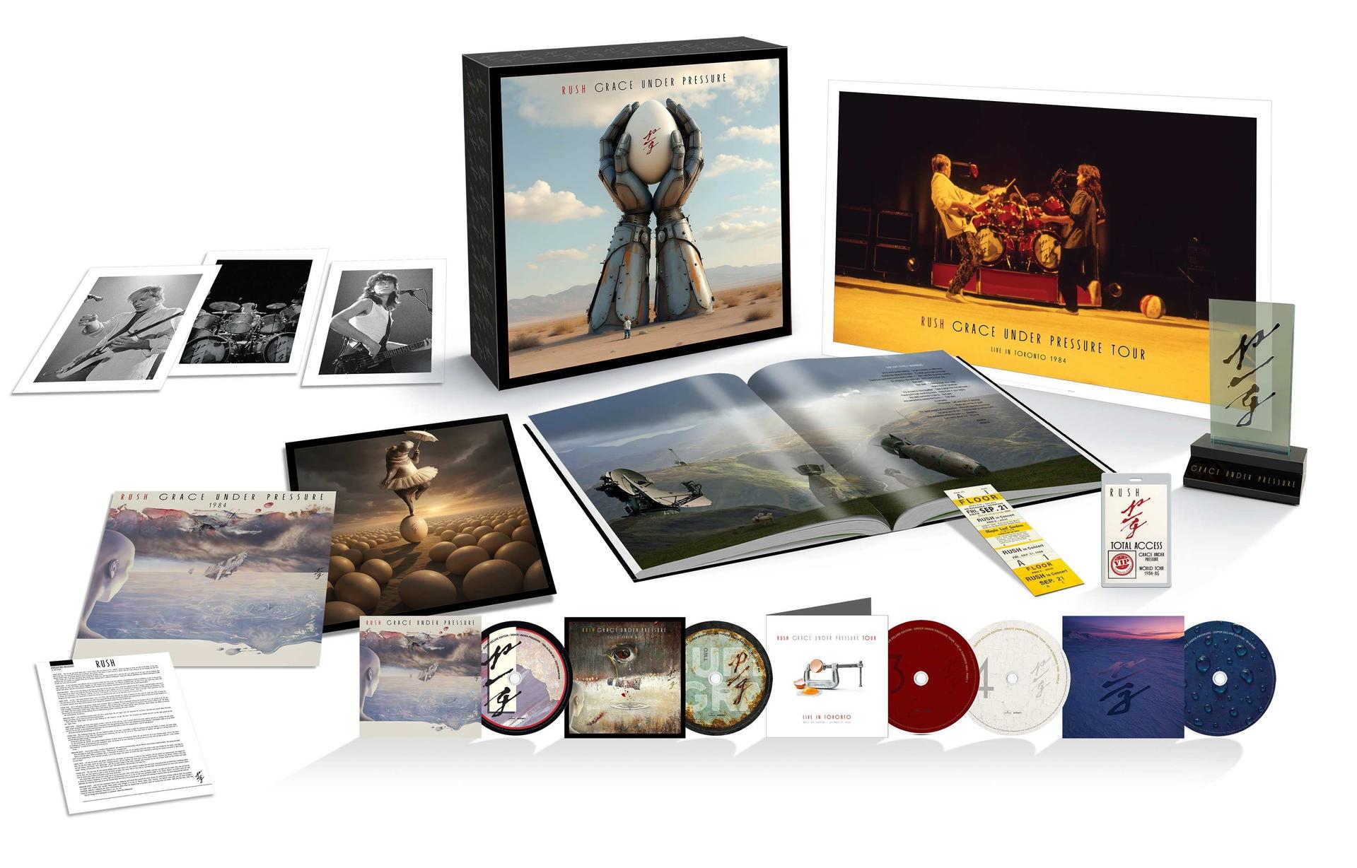Rush "Grace Under Pressure" díszdoboz fotókkal, könyvvel, LP-kkel, CD-kkel és jegyekkel.