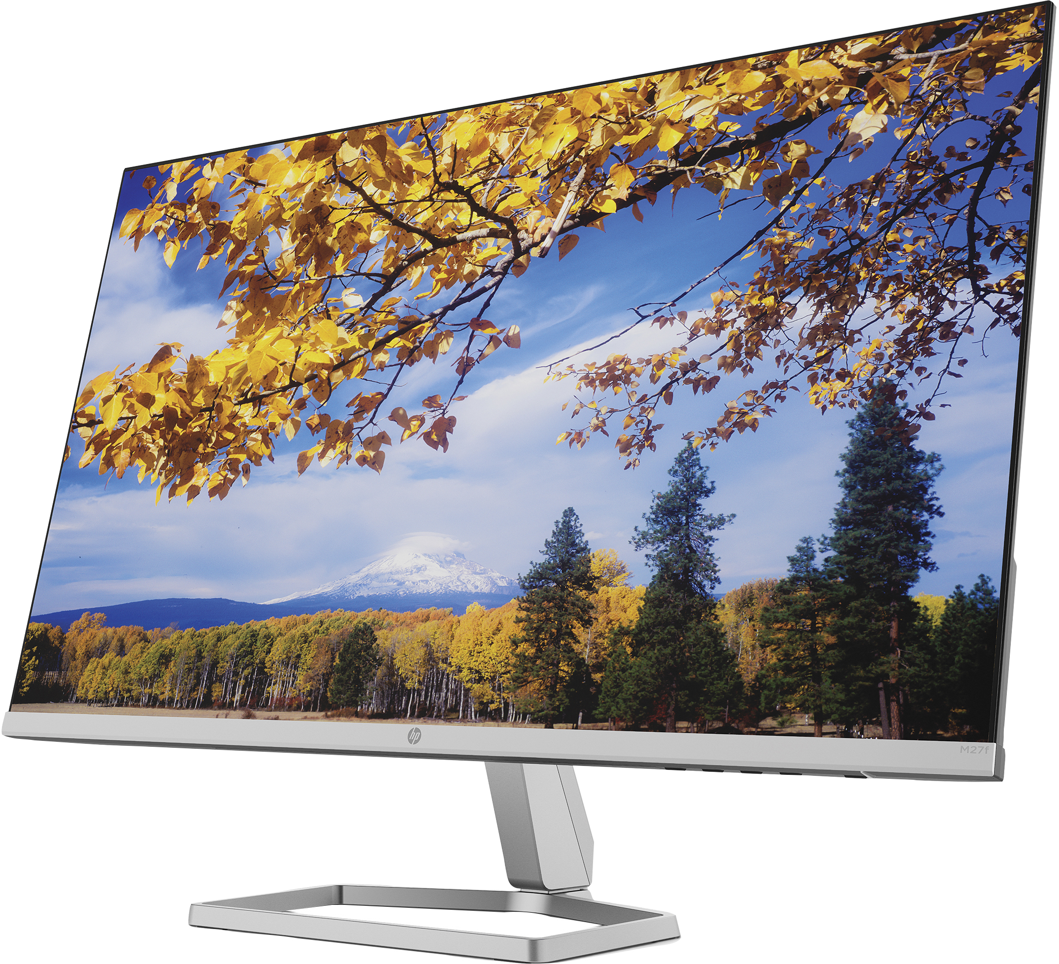 Monitor wyświetla jesienny las ze zaśnieżoną górą w tle.
