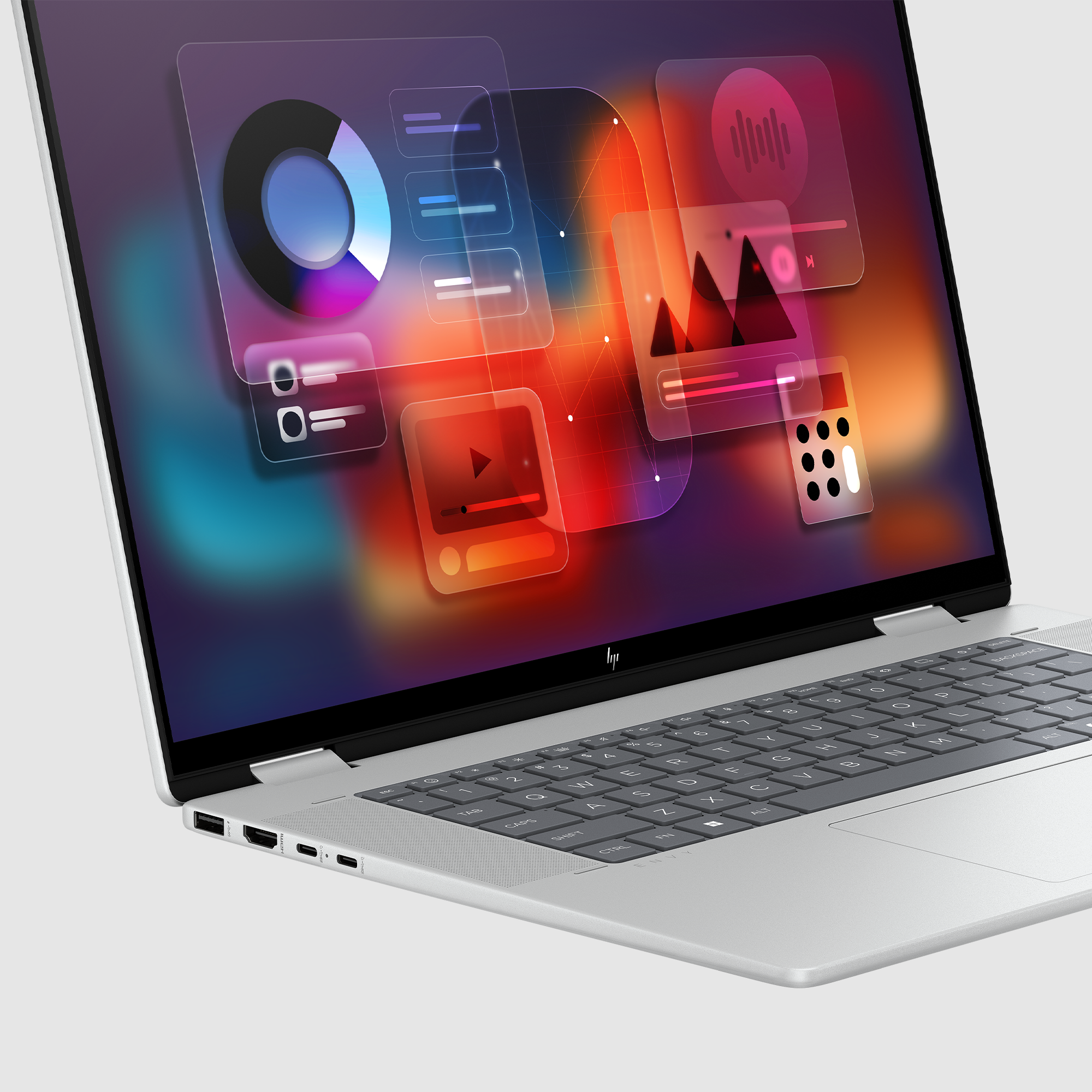 Laptop z interfejsem użytkownika zawierającym wykresy i kontrolki odtwarzania.