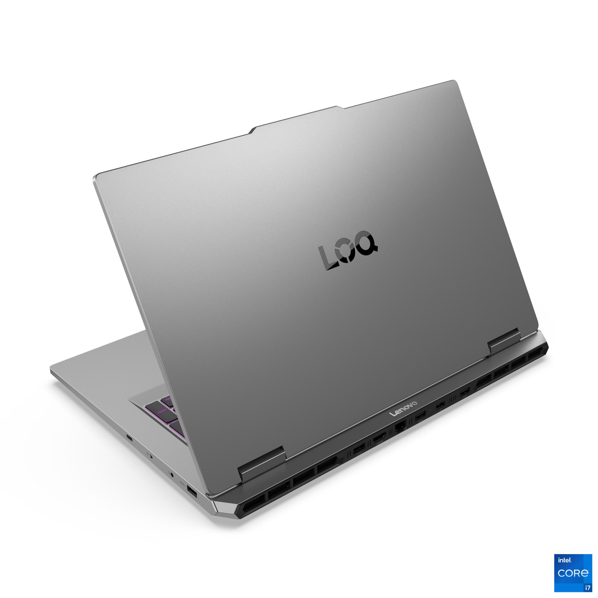 LOQ logolu, mor arka aydınlatmalı tuşlu, Intel Core i7 etiketli gümüş Lenovo dizüstü bilgisayar.