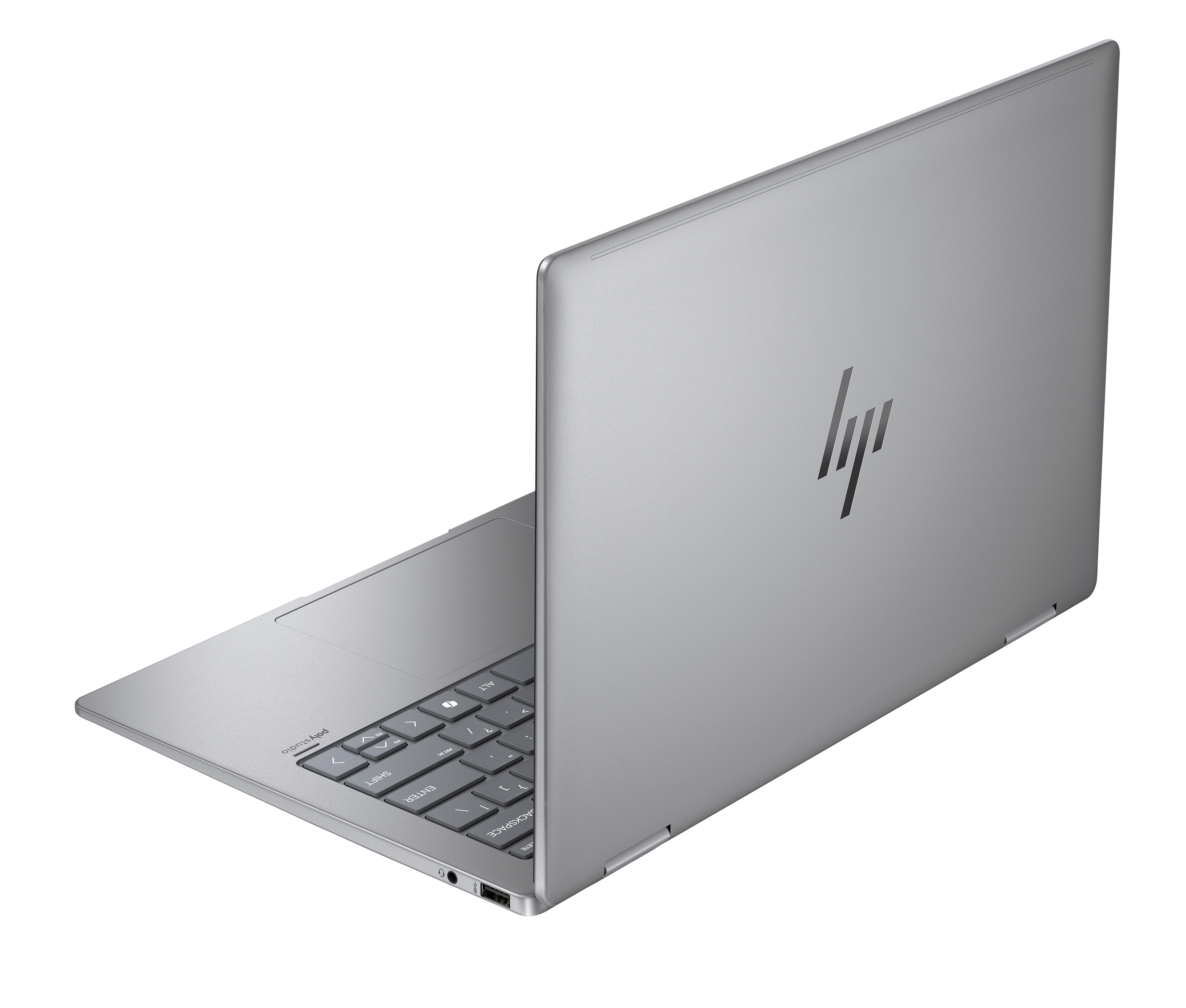 Srebrny laptop HP z podświetlaną klawiaturą na czarnym tle.