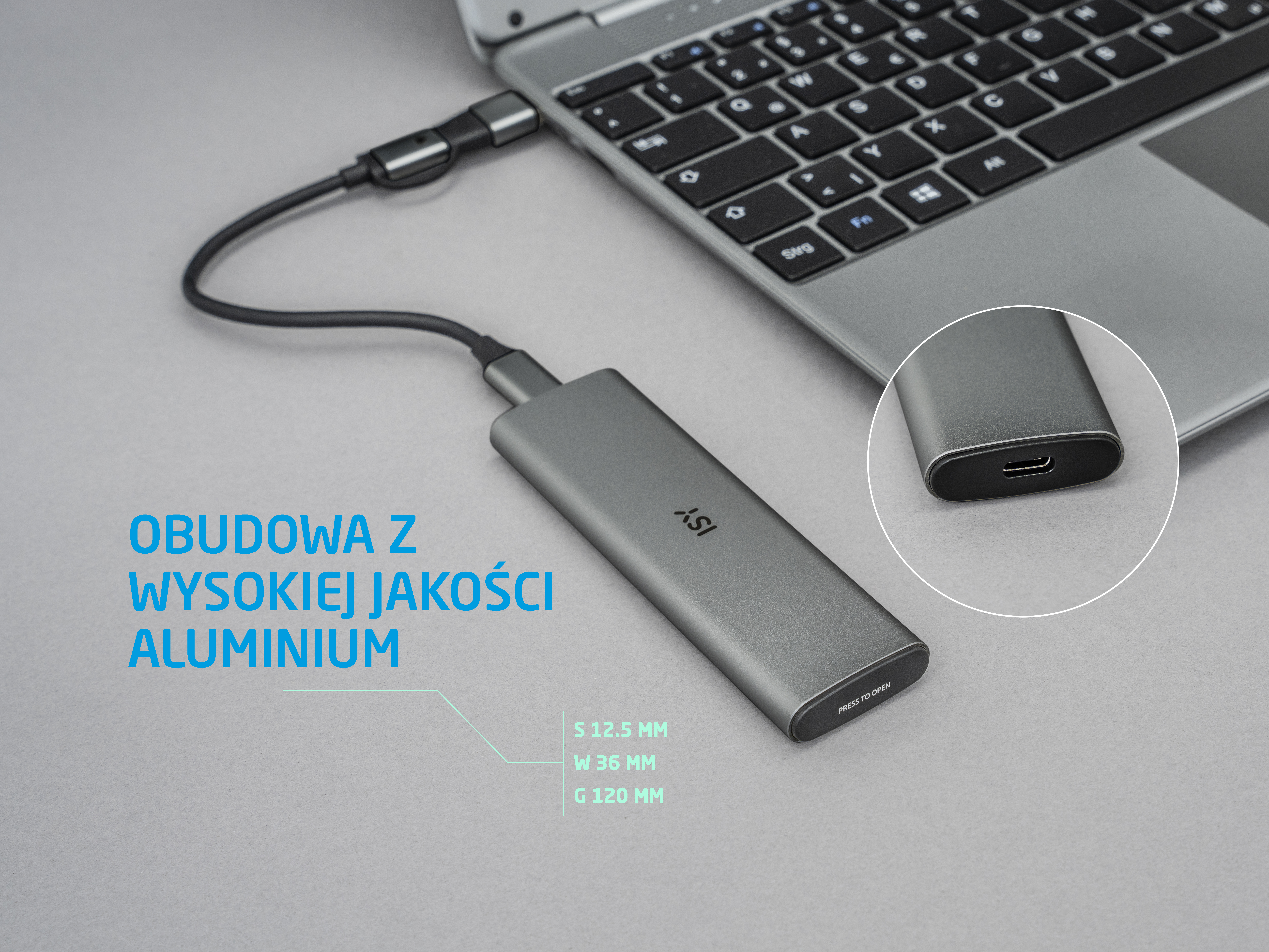 Szara obudowa zewnętrzna podłączona do laptopa.