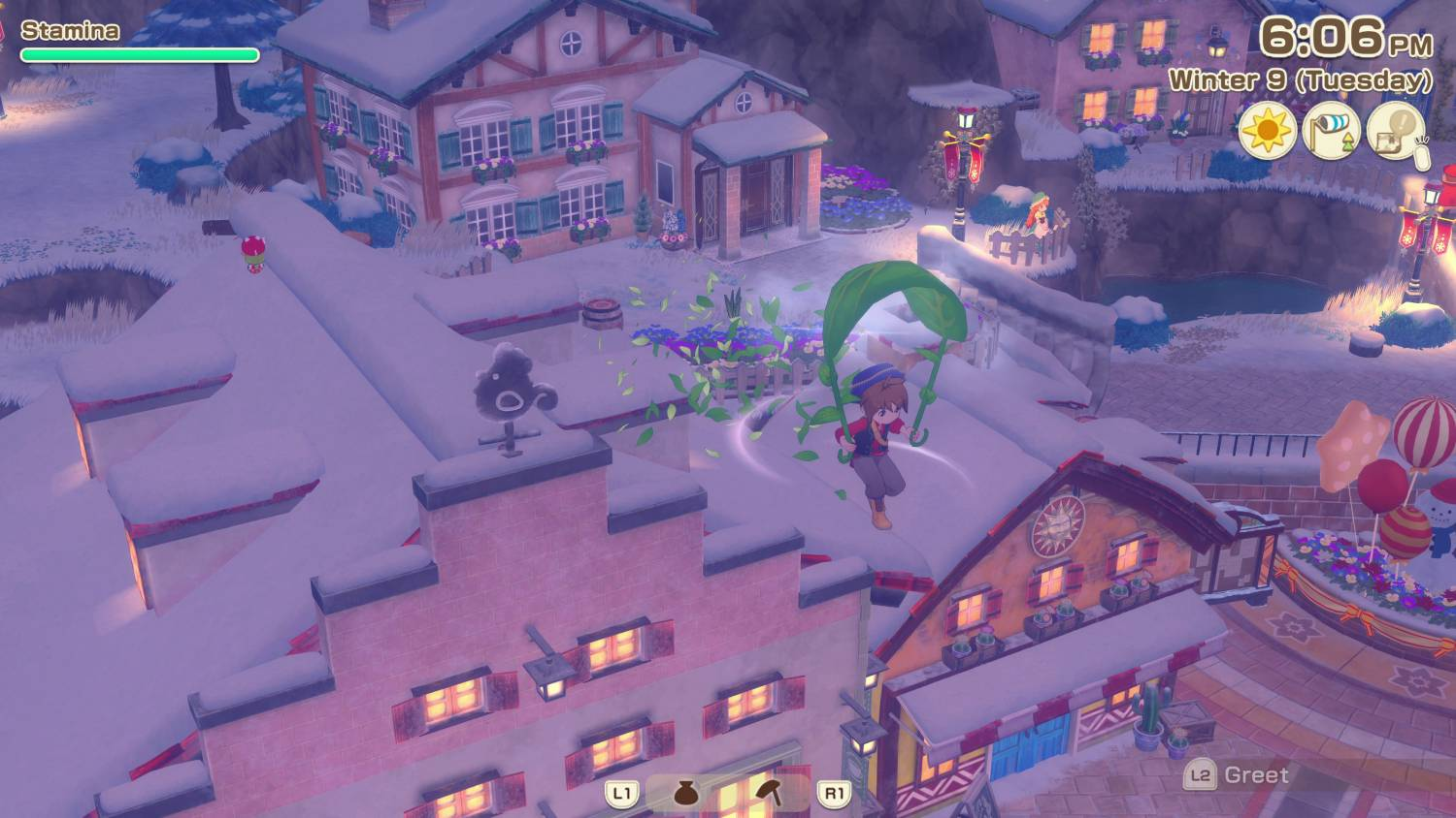 Una persona sobrevuela con una hoja sobre un pueblo nevado con casas pintorescas y luces festivas.