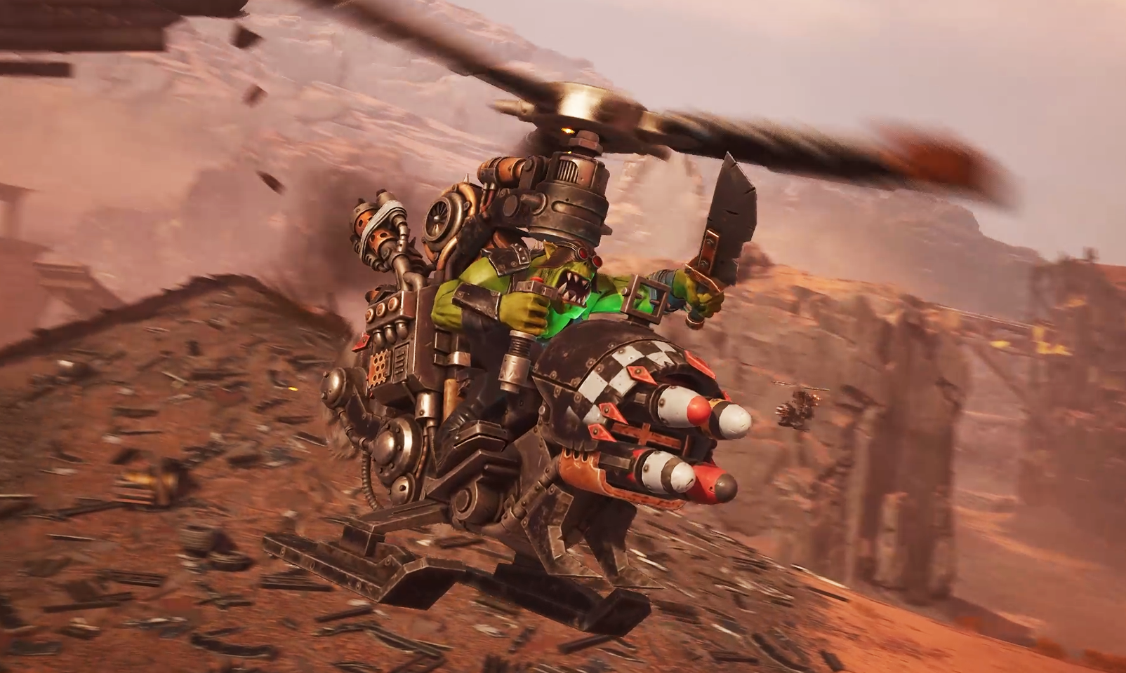 Un orco verde en un helicóptero vuela sobre un paisaje rocoso.