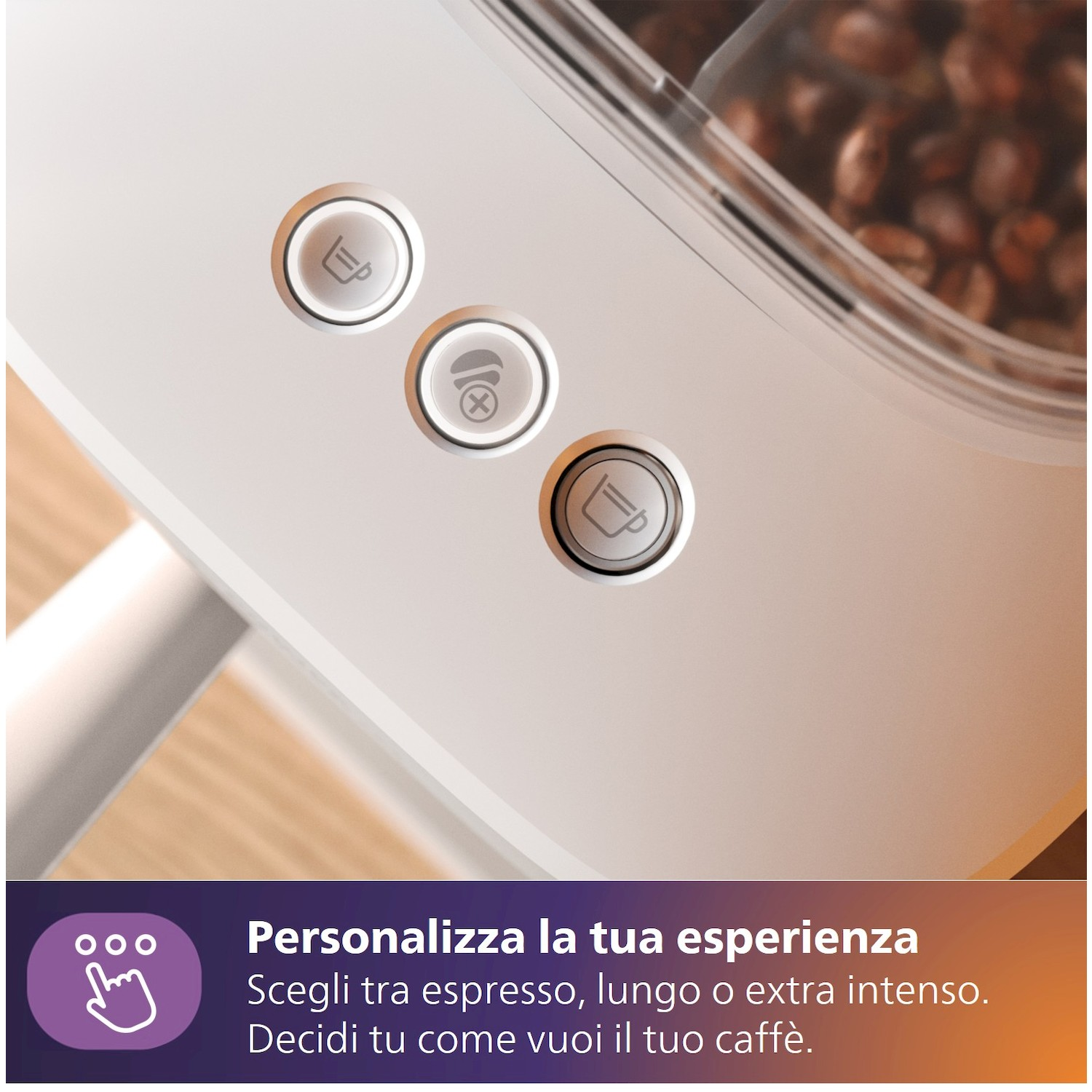 Tre pulsanti per scelta caffè: espresso, lungo, extra intenso. Macchina bianca.