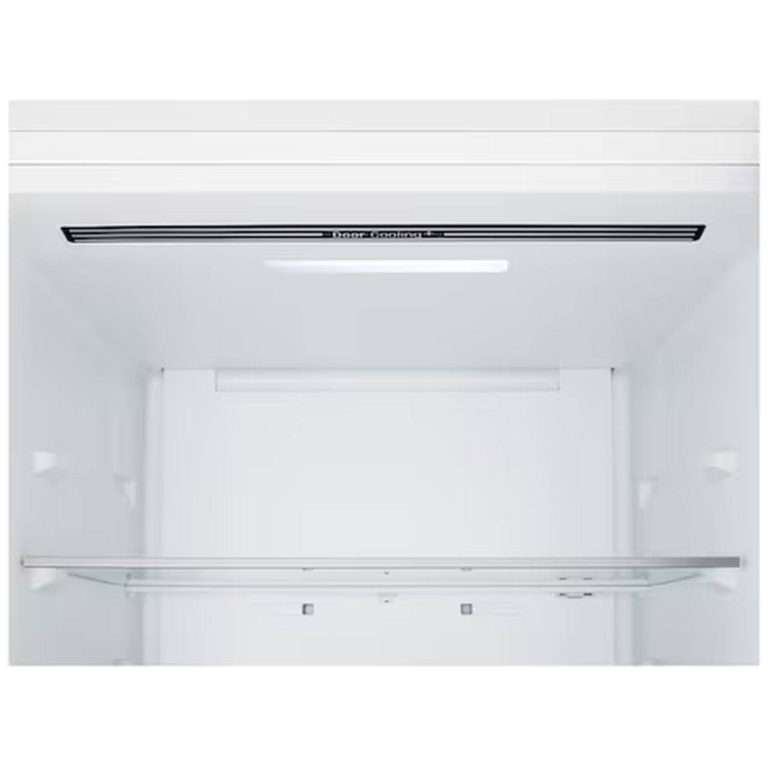 An empty refrigerator with a glass shelf and a ventilation strip.