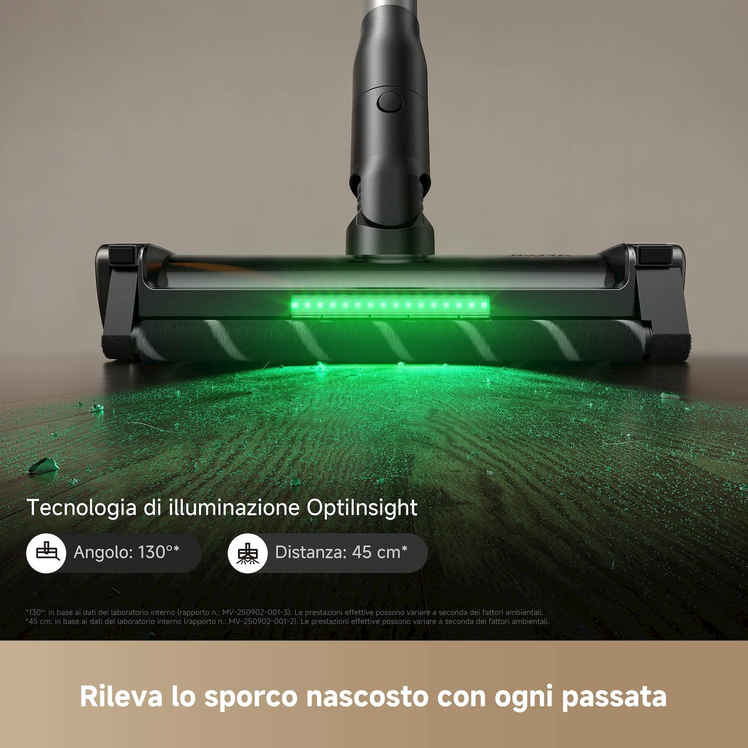 Testina aspirapolvere con illuminazione LED verde su pavimento in legno.