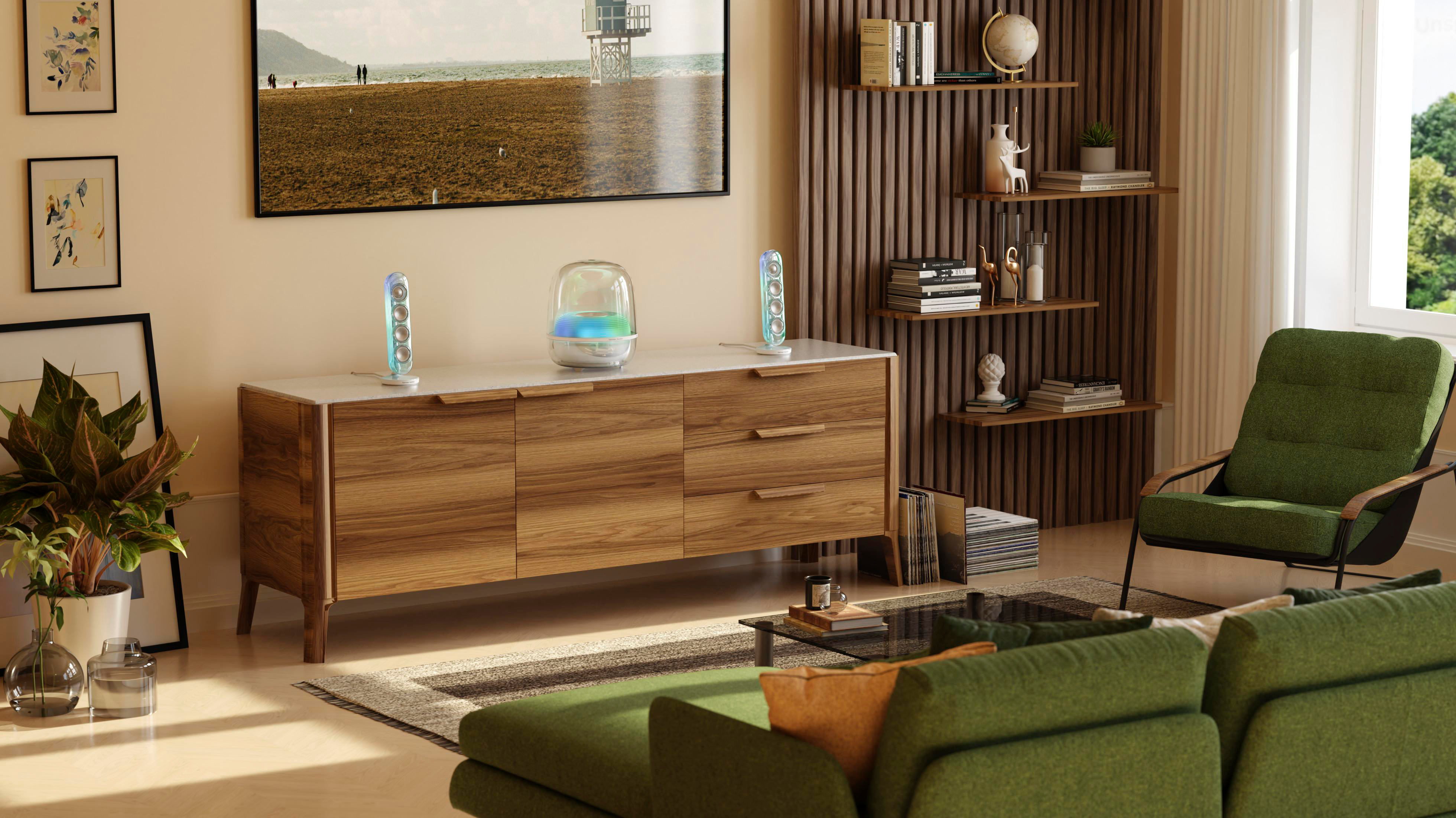 Ein Wohnzimmer mit grünen Sofas, einem Holzbüfett und Dekoration.
