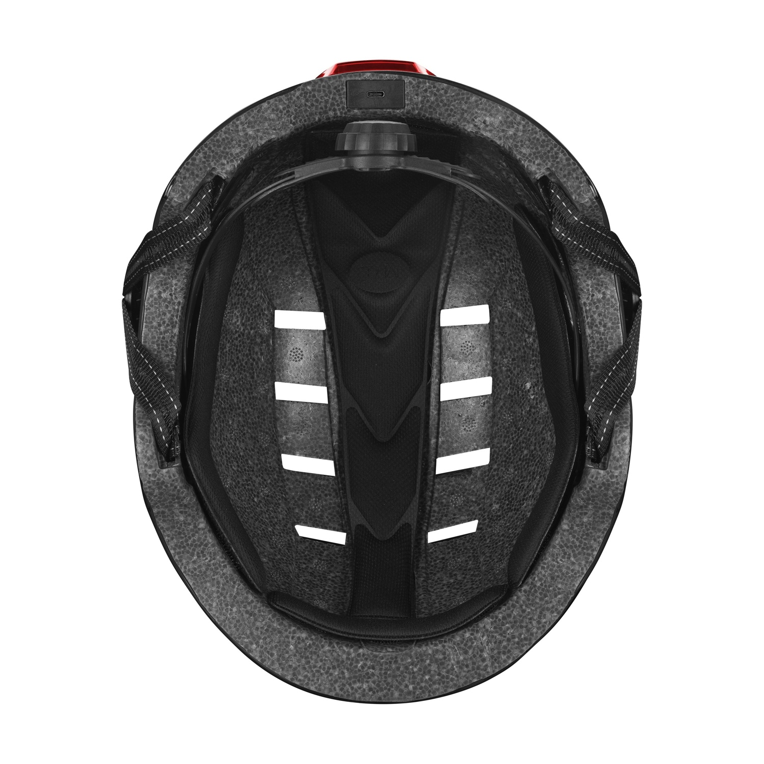 Vista interna di un casco da bicicletta con imbottitura nera e luce posteriore rossa.