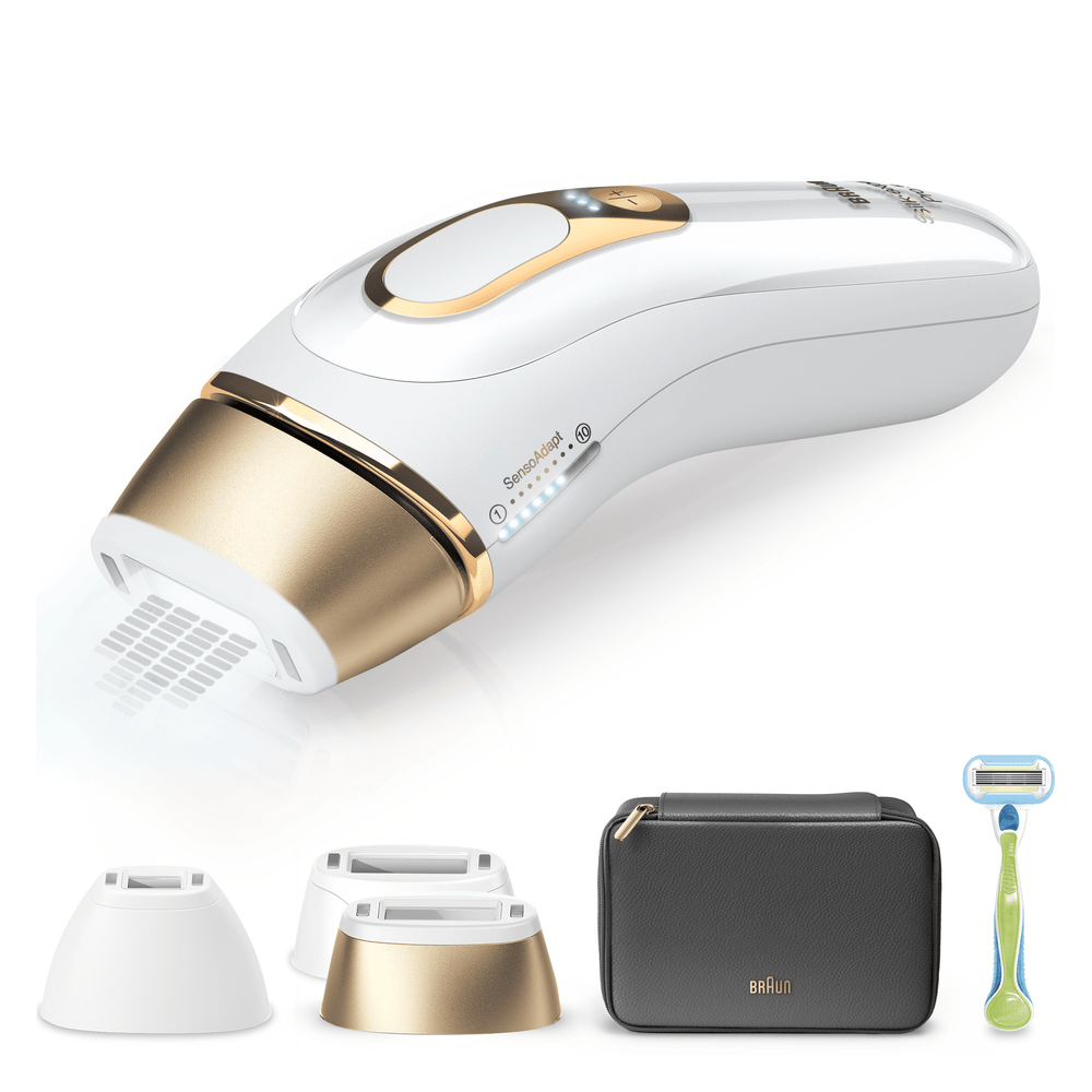 Dispositivo IPL Braun blanco con detalles dorados, rasuradora, estuche y accesorios.