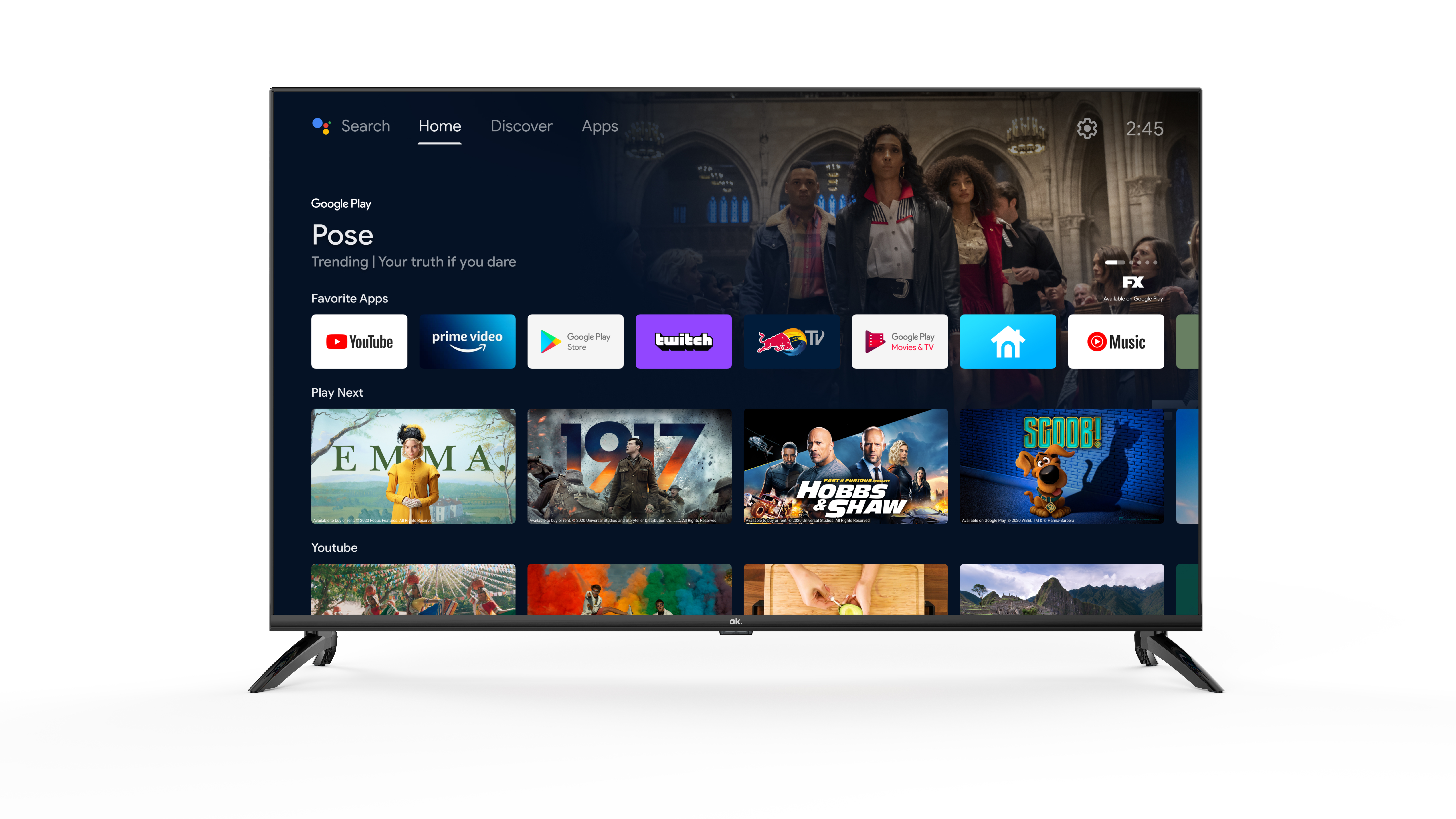 Ekran telewizora wyświetla interfejs Google TV z aplikacjami takimi jak YouTube, Prime Video i zwiastuny filmów.