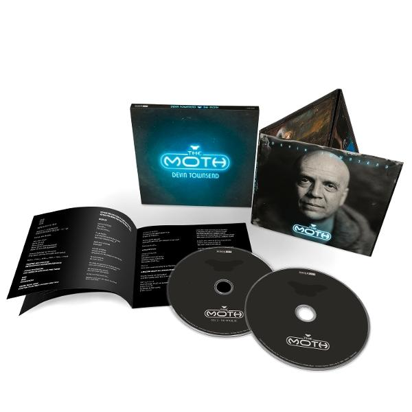 Ein aufgeschlagenes CD-Set mit einem Buch und zwei CDs.
