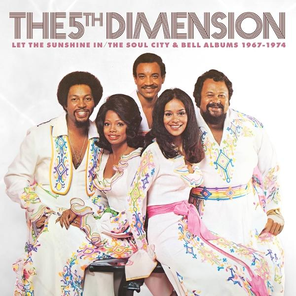 Die 5th Dimension posiert in bunten Outfits. Text oben: 'The 5th Dimension'.