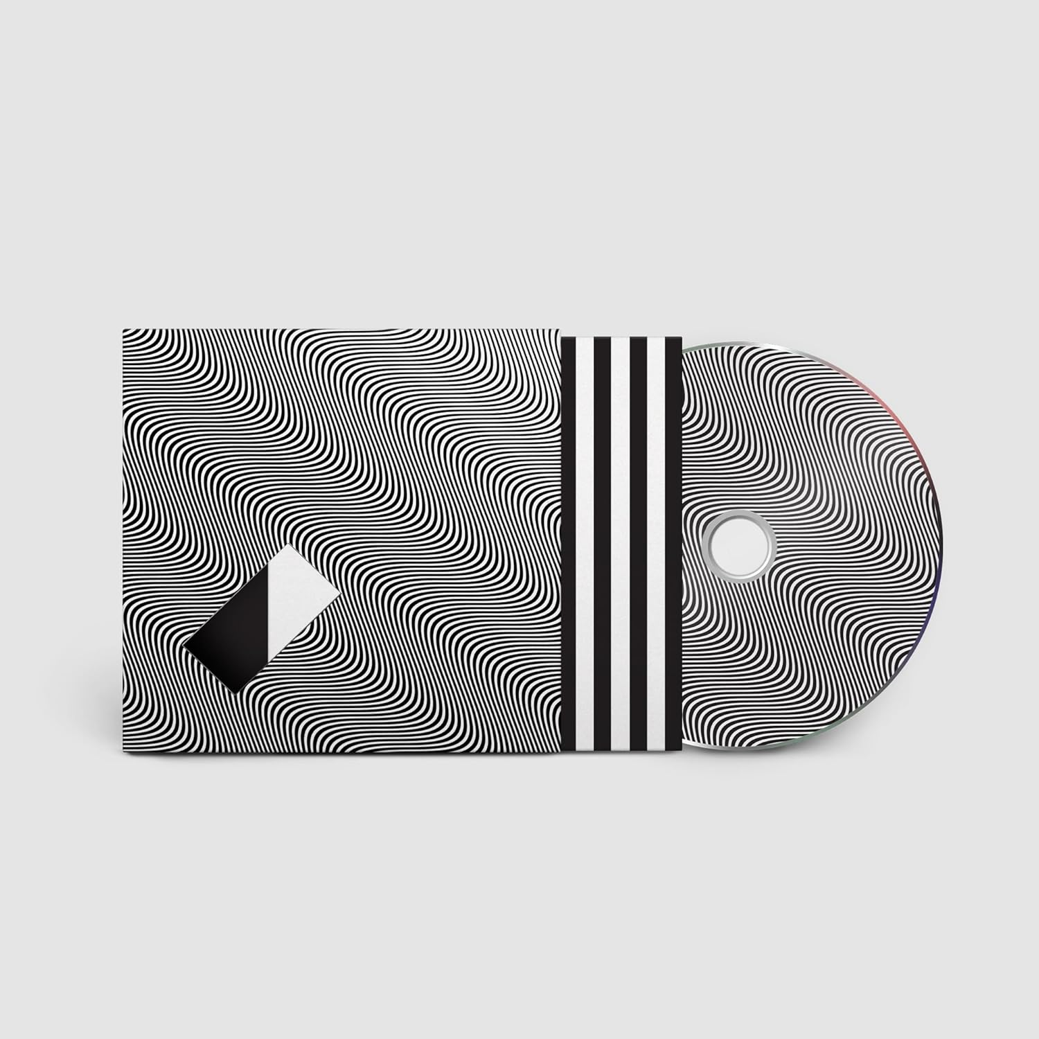 CD-tok hullámmintával, csíkokkal és hasonló mintájú CD-vel.