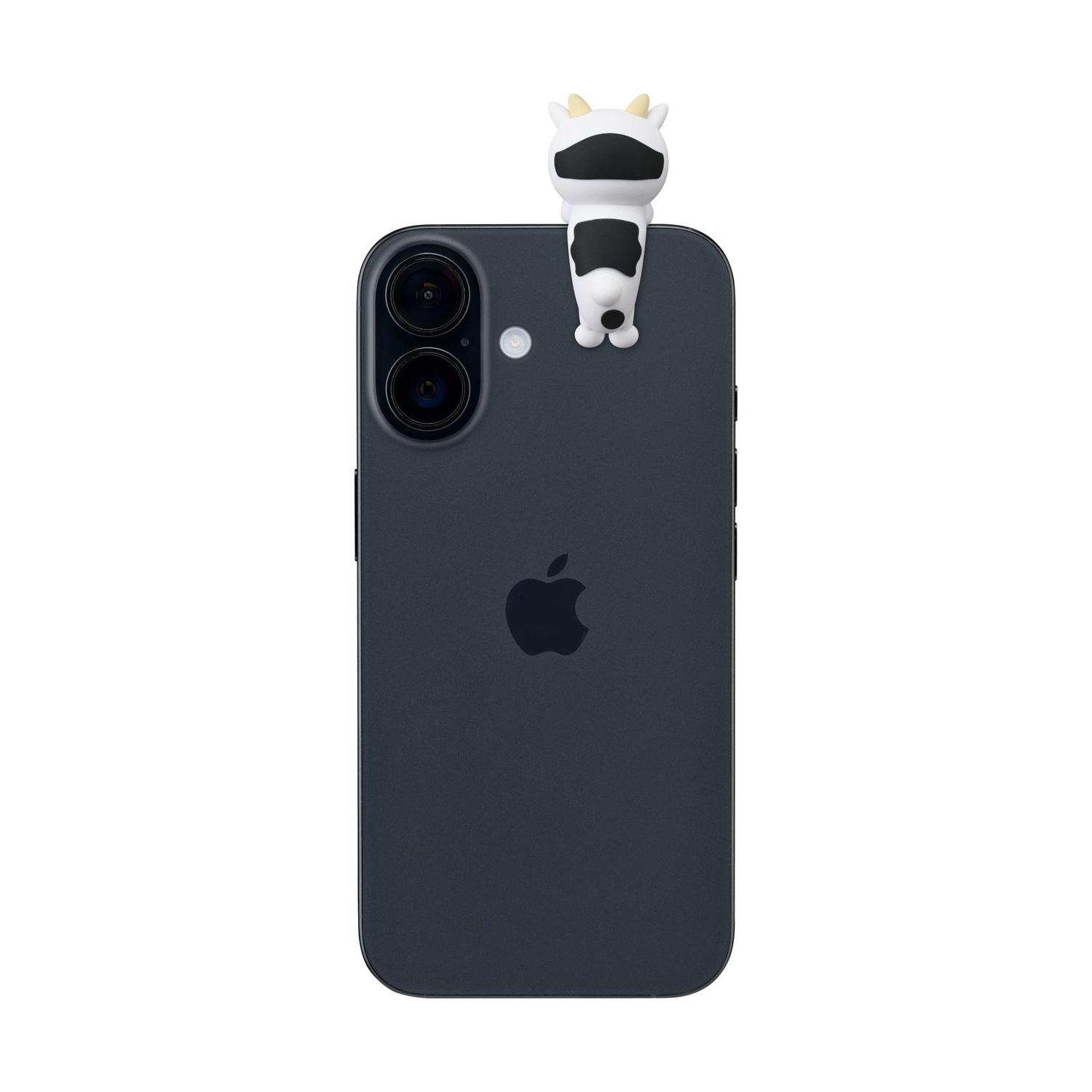 Un iPhone nero con un grazioso ciondolo a forma di mucca sulla fotocamera.