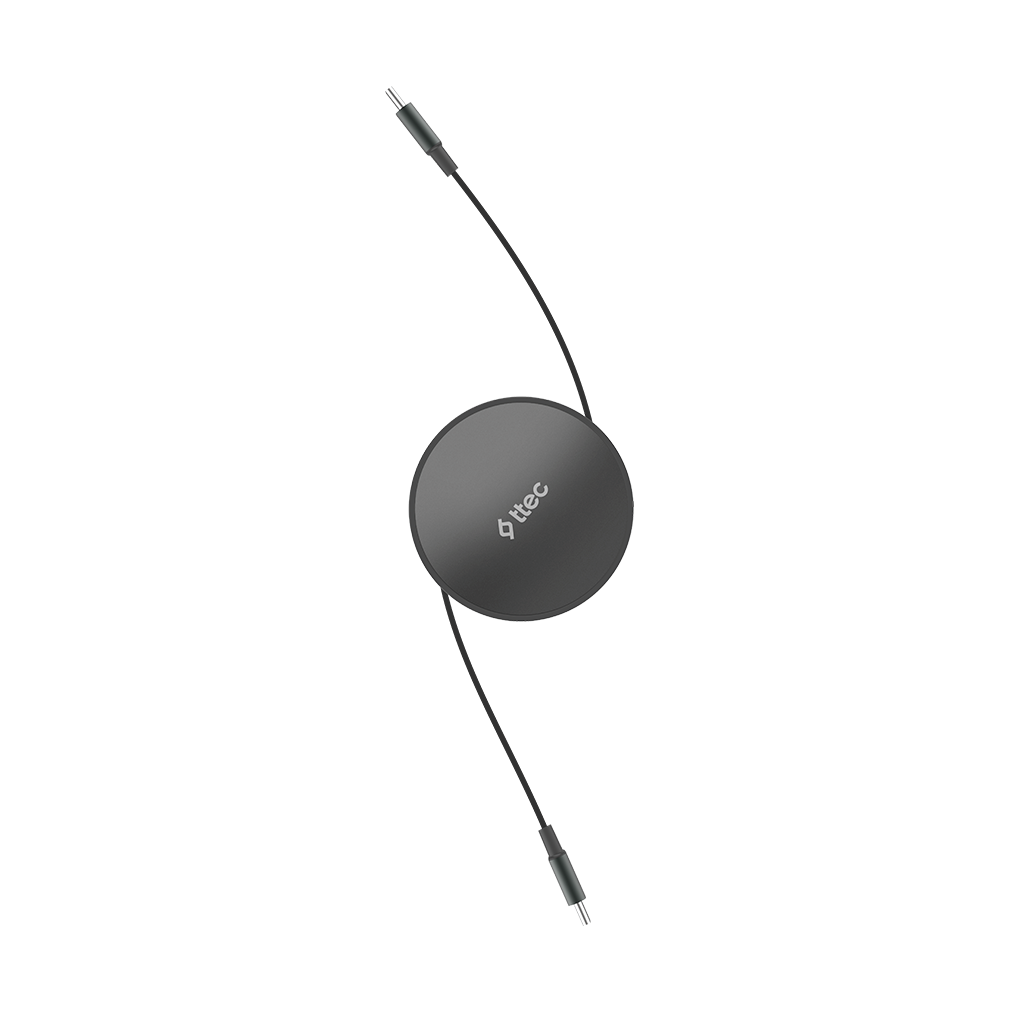 USB-C kablosu ve fişi olan gri, yuvarlak şarj kutusu.