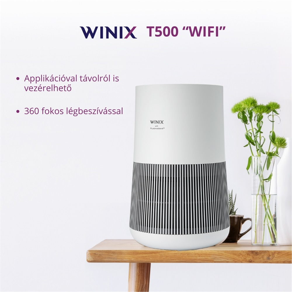 Fehér légtisztító WINIX logóval faasztalon.