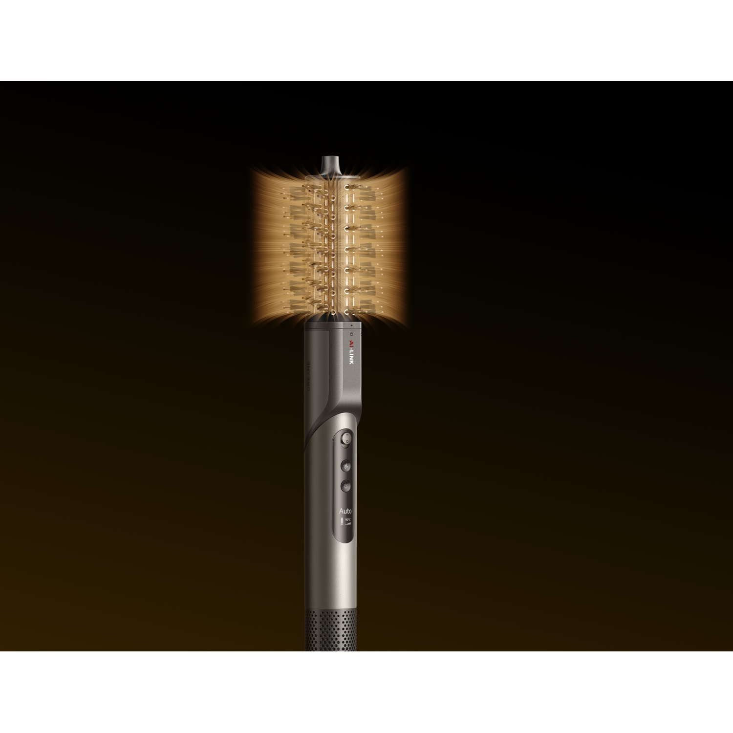 A dark hairdryer with a rotating brush featuring golden bristles.