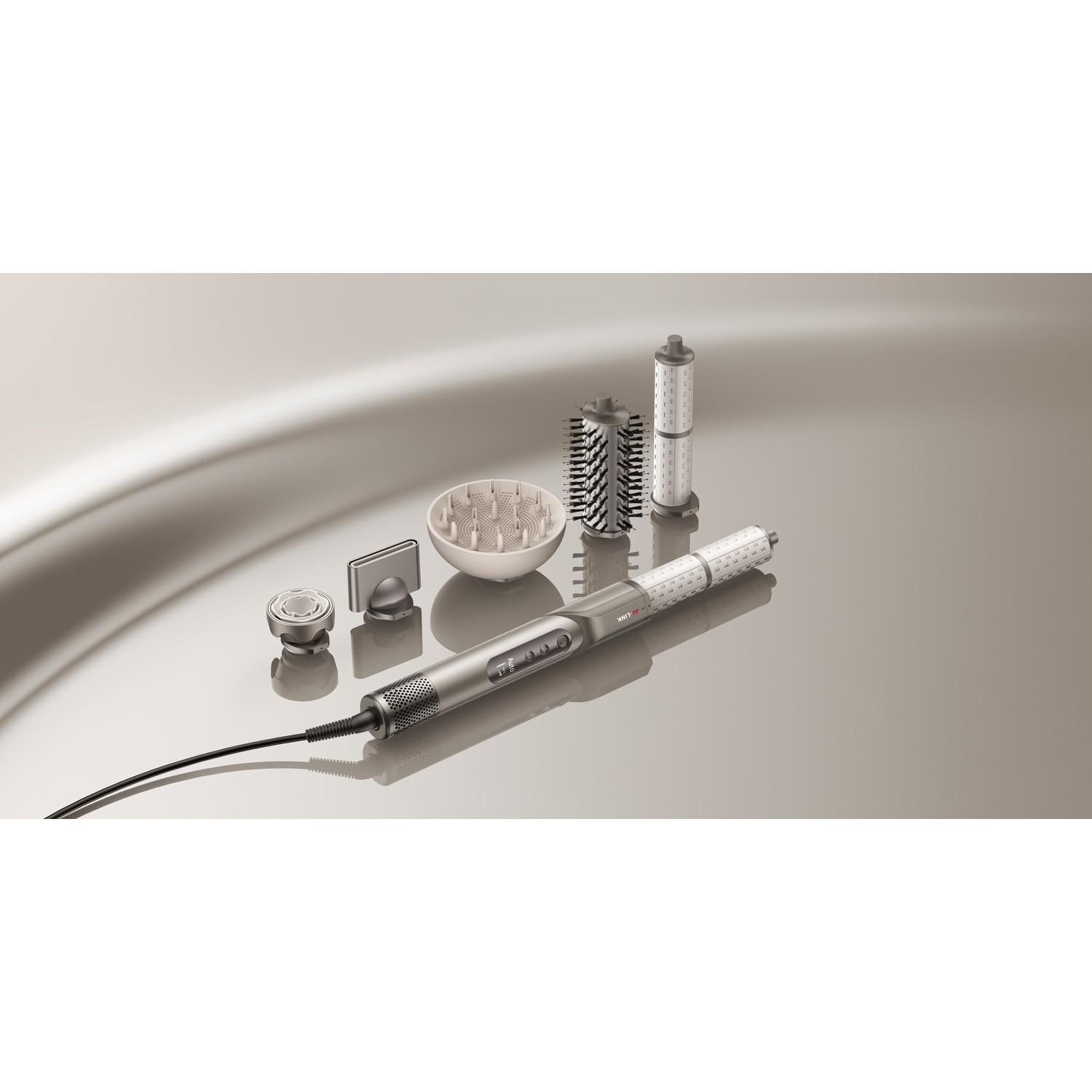A silver hair dryer with multiple attachments on a reflective surface.