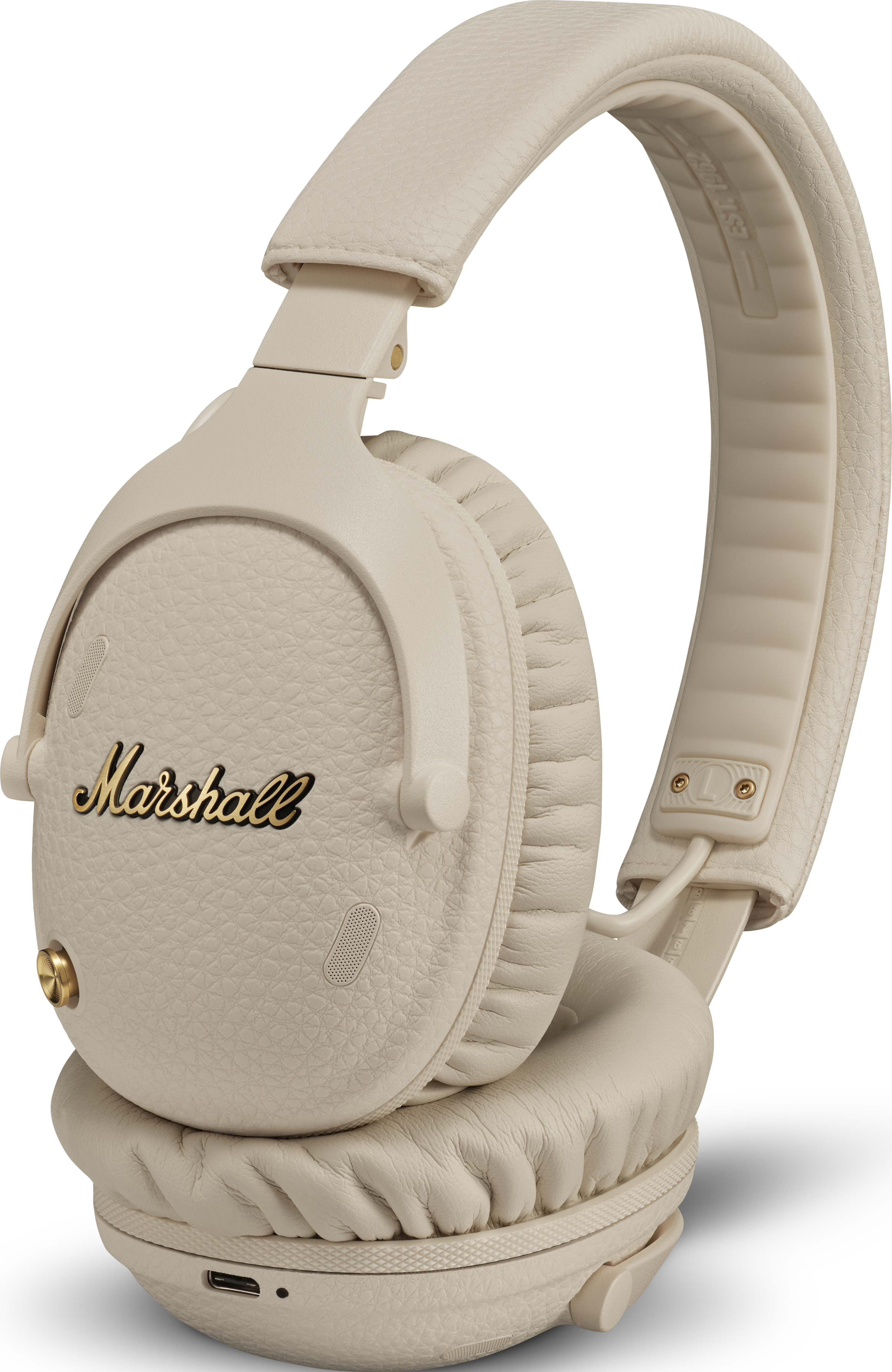 Cuffie Marshall color crema con logo dorato e texture in pelle.