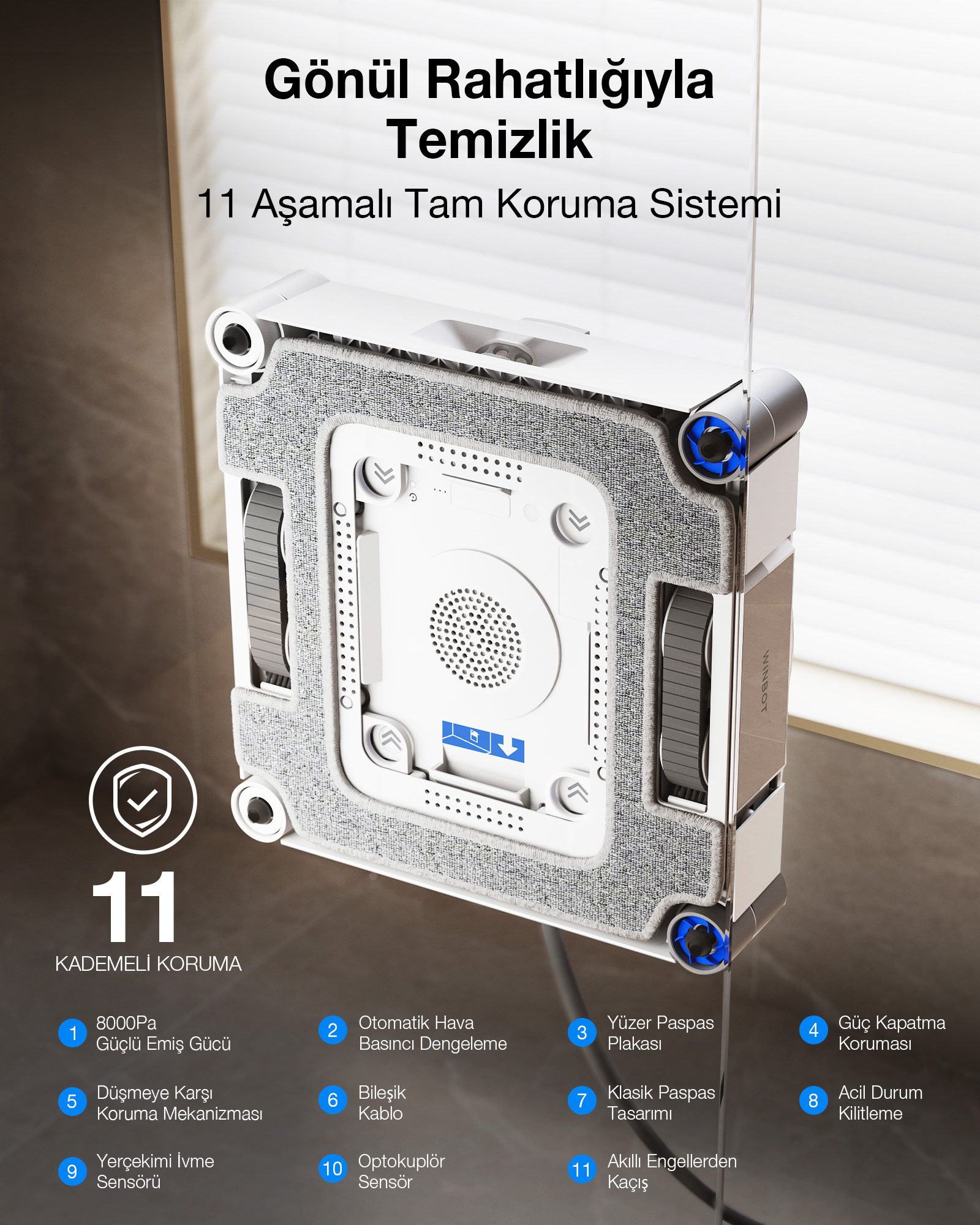 Turkuaz vurgulu beyaz pencere temizleme robotu cam yüzeye yapışık.
