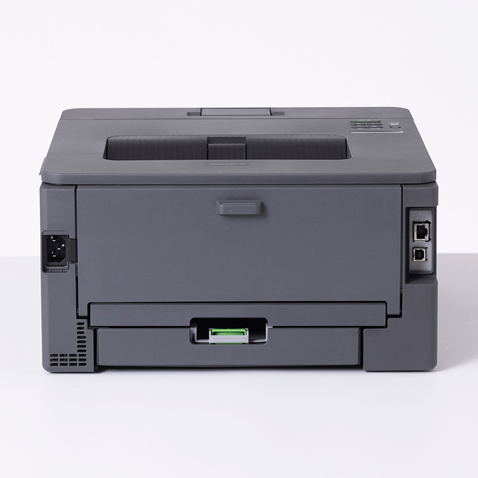 Drucker mit Anschlüssen und einem Fach für Papier. Graues Gehäuse.