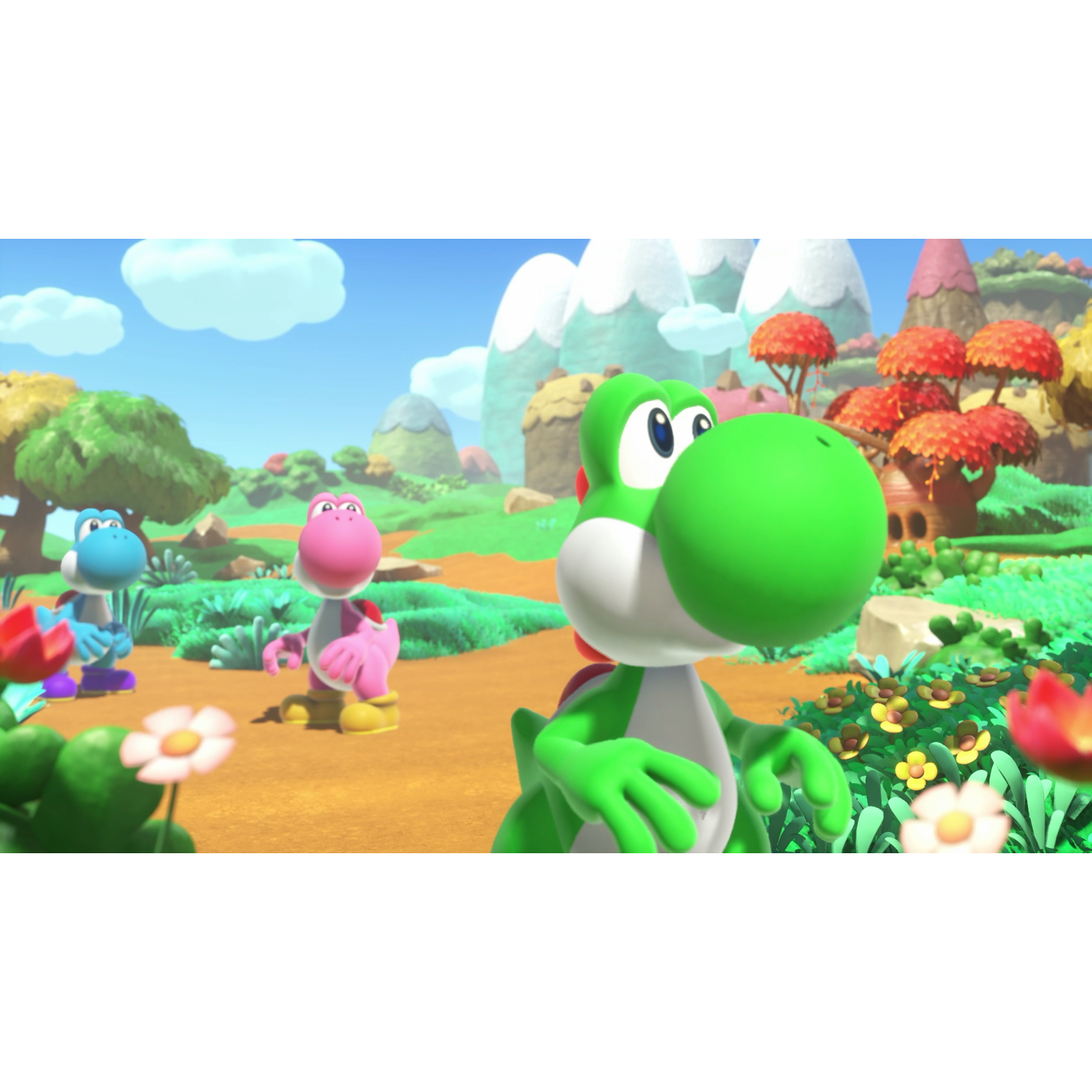 Green, pink, and blue Yoshis in a colorful landscape with flowers and mountains.