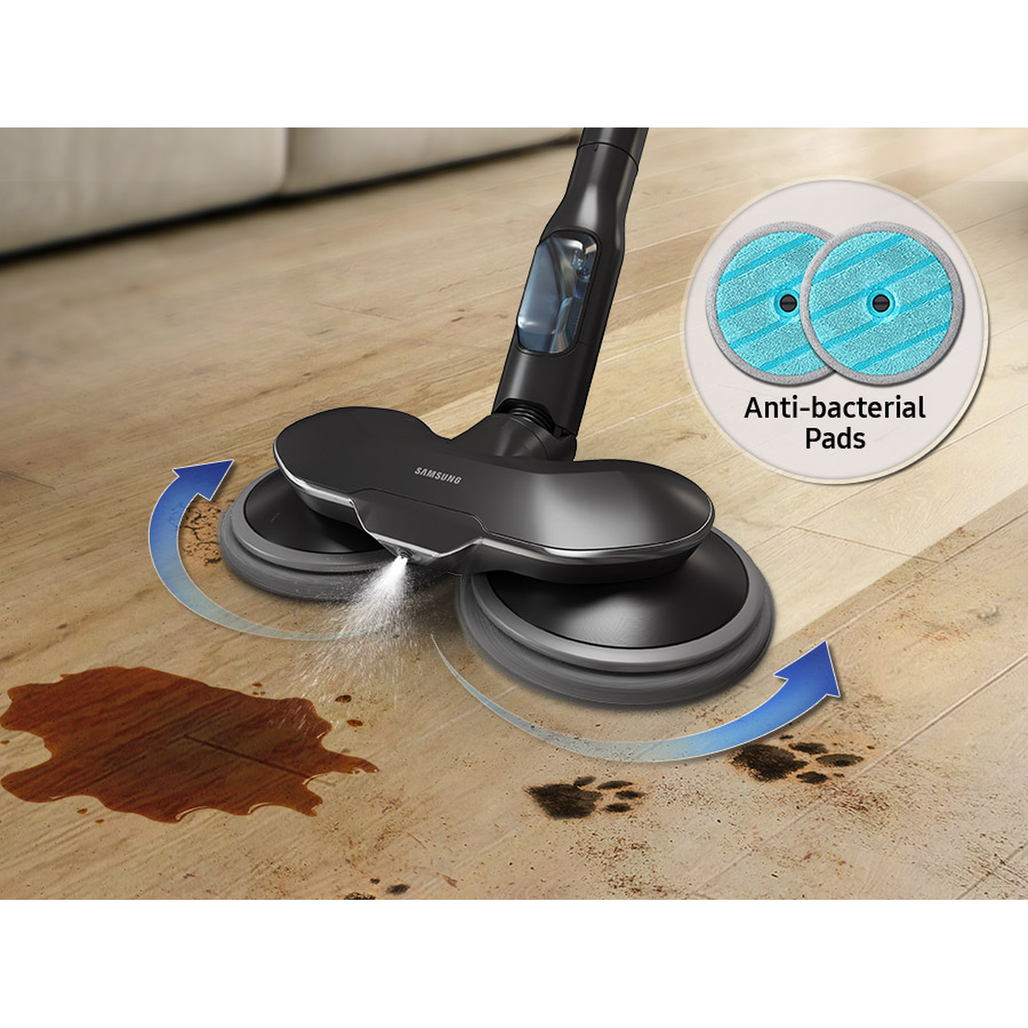 A vacuum cleaner mops a wooden floor, cleaning stains and paw prints.