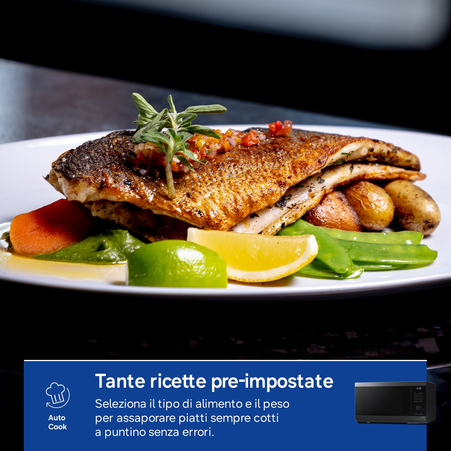 Filetto di pesce arrosto con patate, carote, piselli, limone e lime.