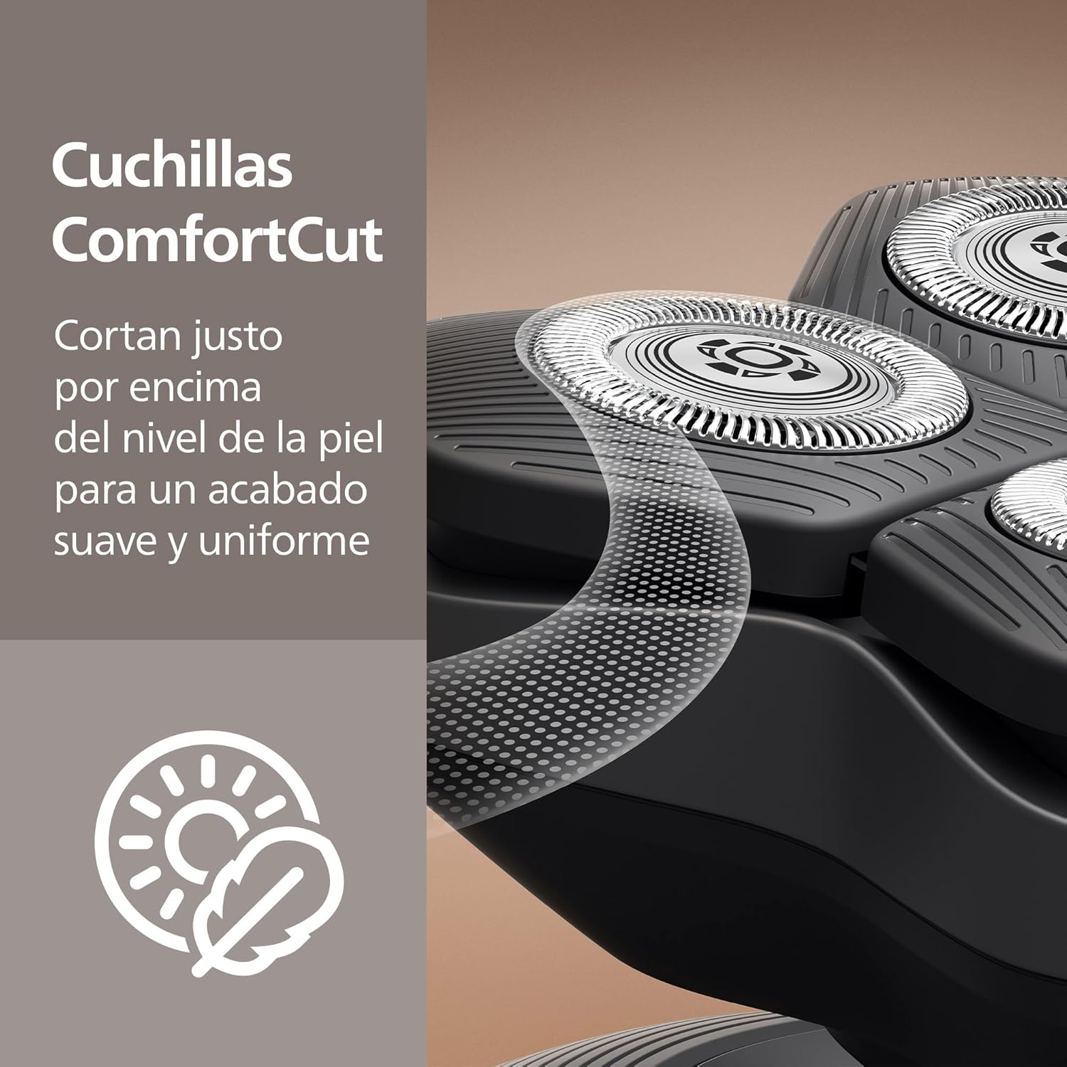 Primer plano de un cabezal de afeitadora con cuchillas ComfortCut. Superficie lisa.
