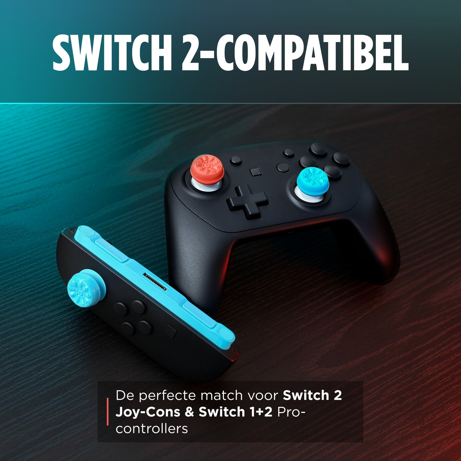 A black controller and a Joy-Con with blue and red caps.
