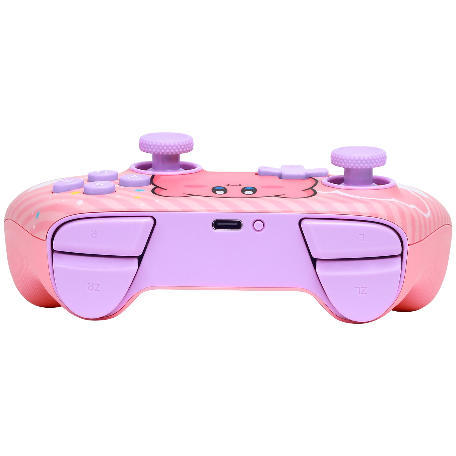 Une manette rose avec un design Kirby et des boutons violets sur fond blanc.