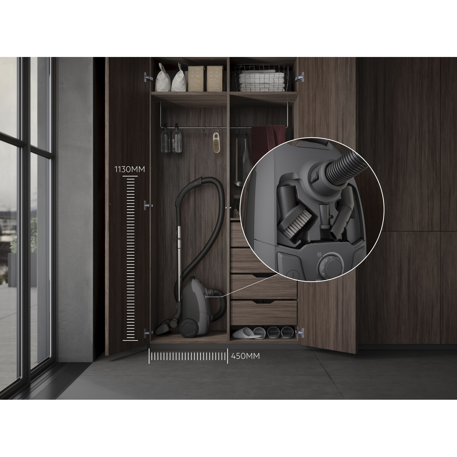 A vacuum cleaner and accessories are stored in a dark wood cabinet.